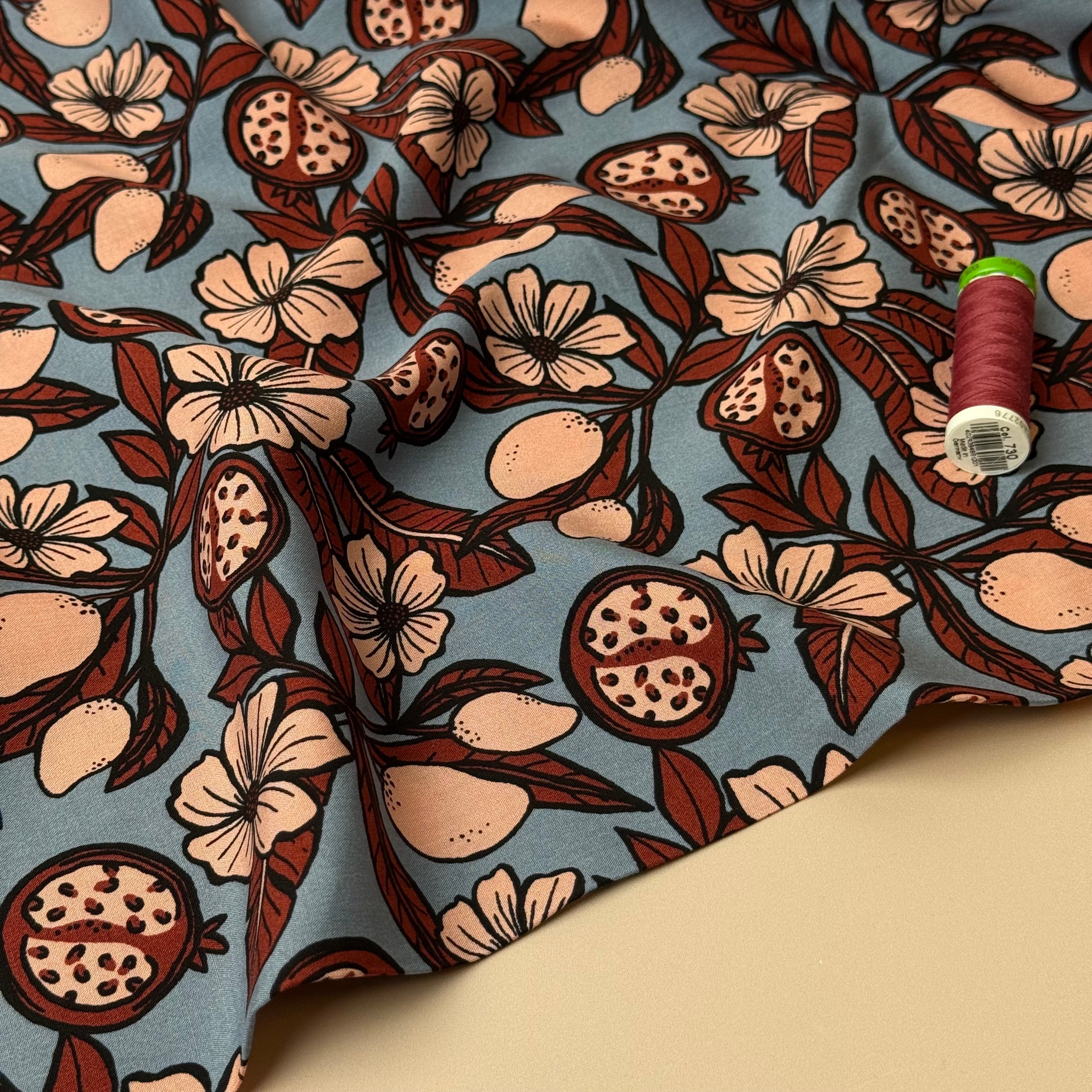Pomegranates on Dusky Blue Viscose Fabric