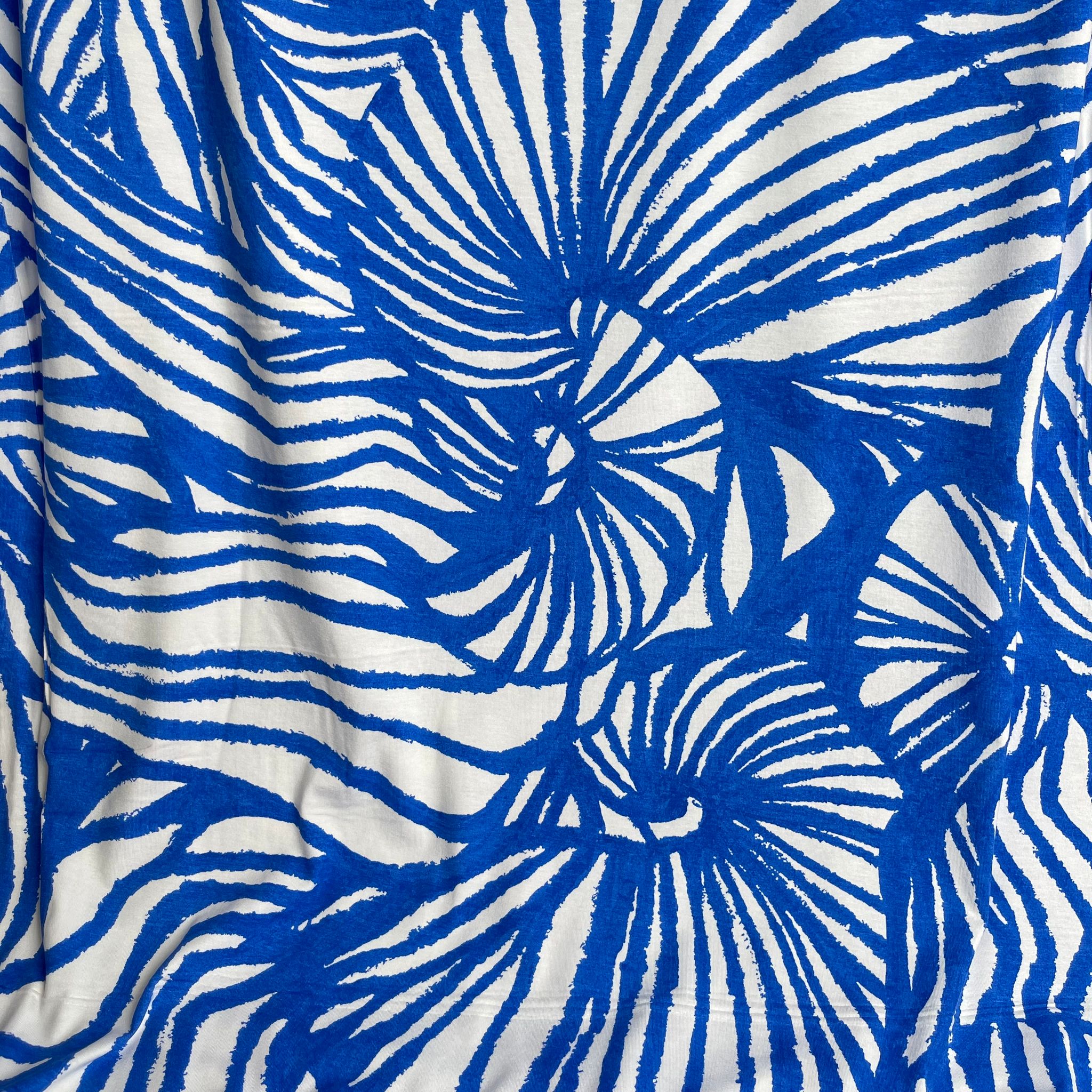 Ex-Designer Deadstock Ammonite Fossils on Blue Viscose Jersey Fabric
