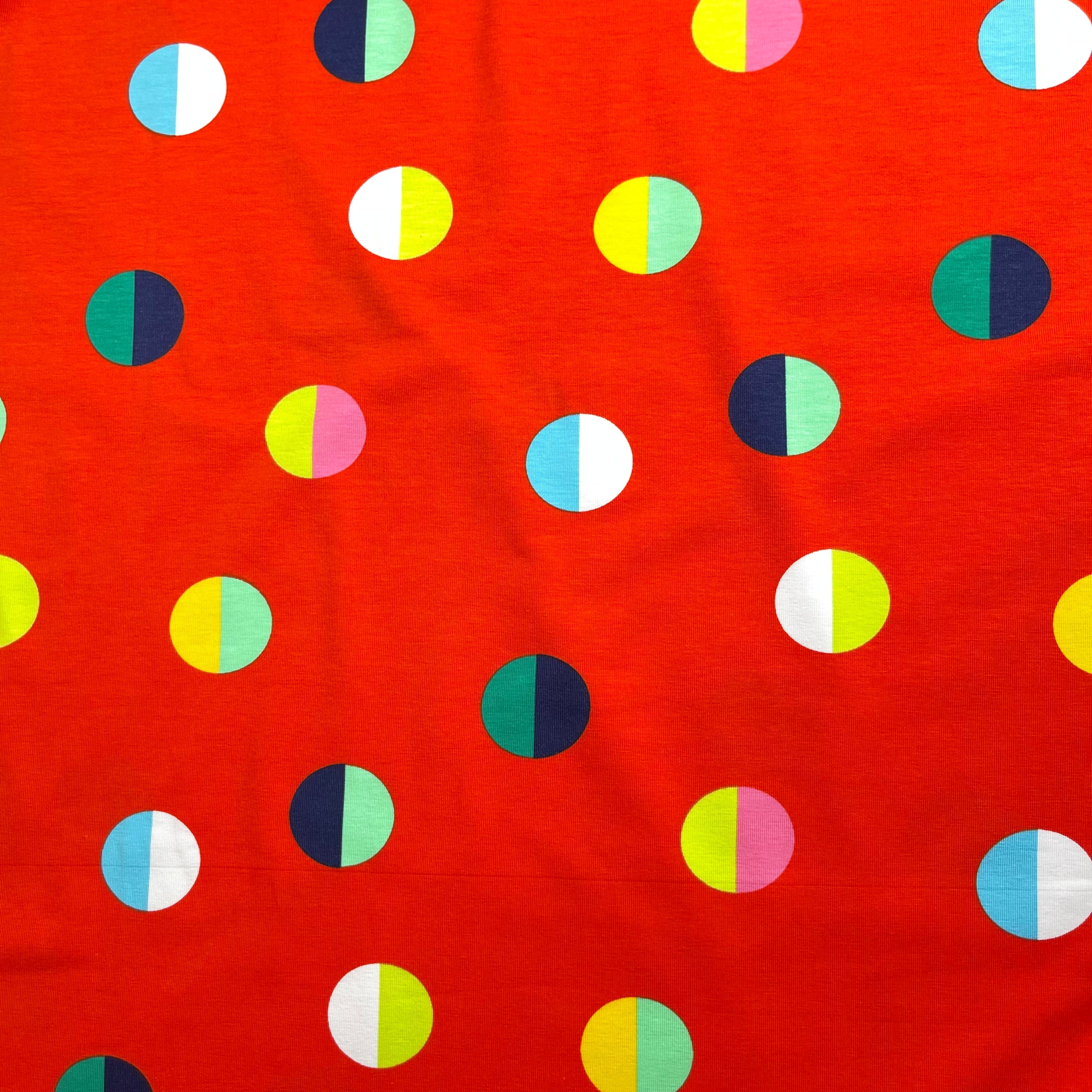 Split Circles on Red Cotton Jersey Fabric