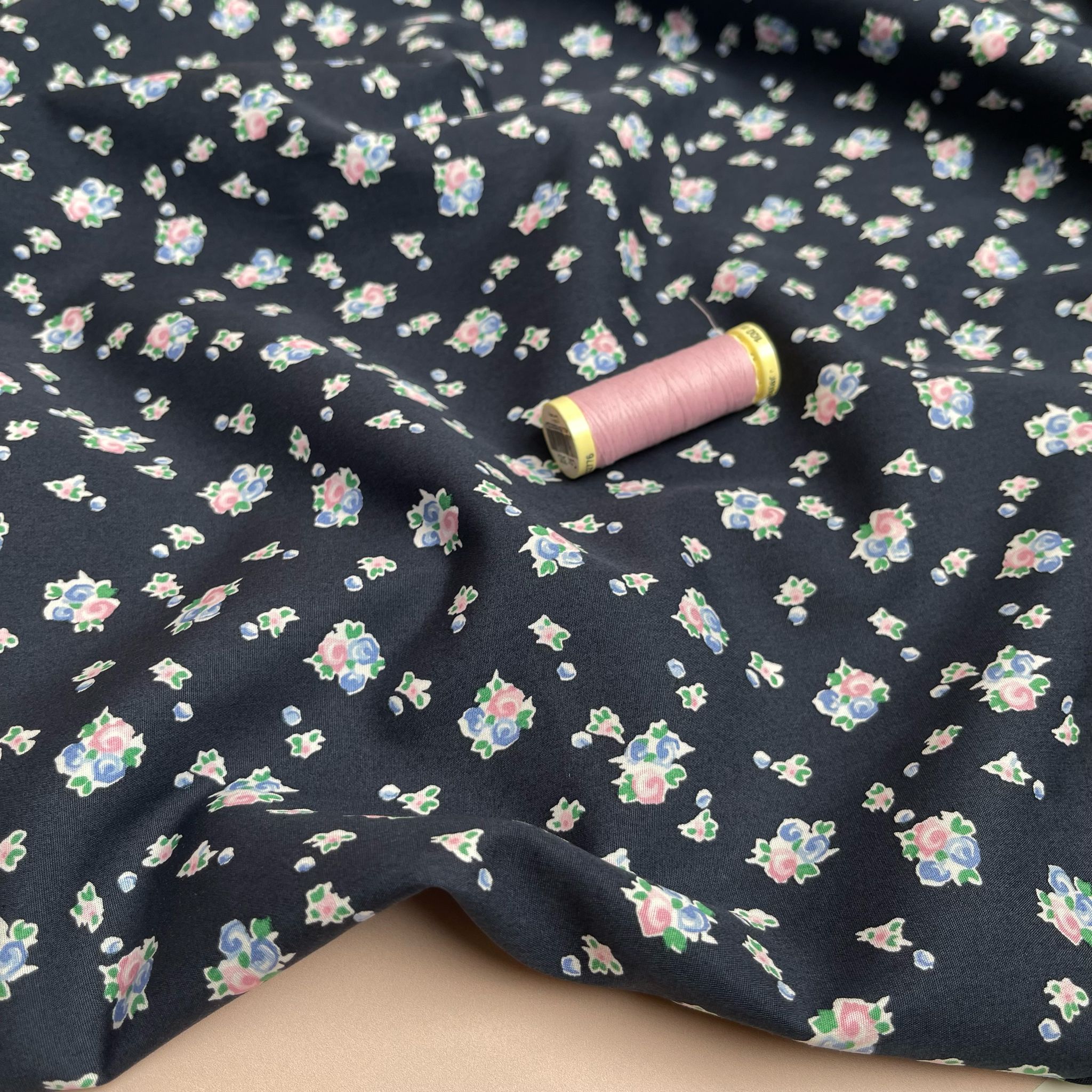 Ex-Designer Pastel Posey on Black Cotton Fabric
