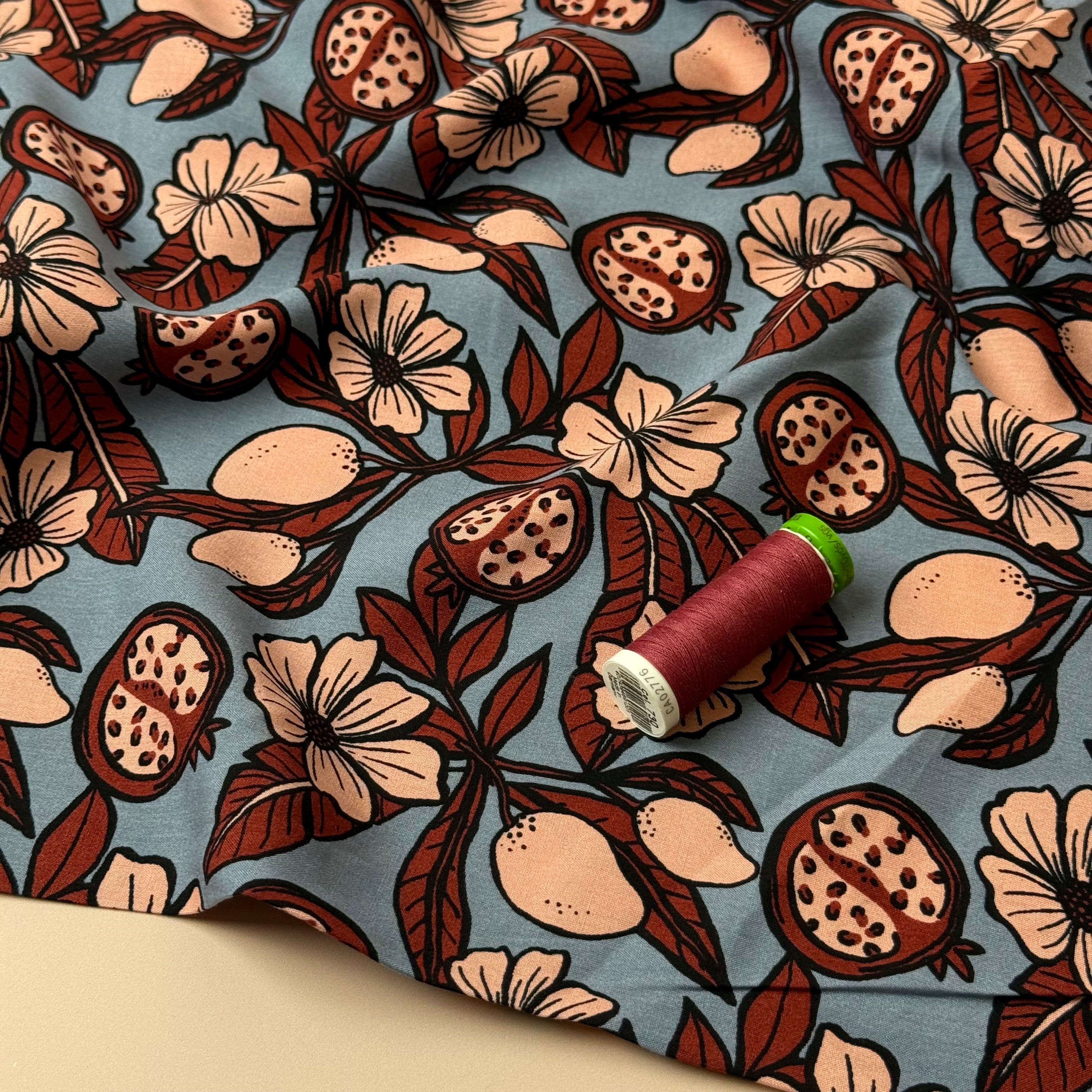 Pomegranates on Dusky Blue Viscose Fabric