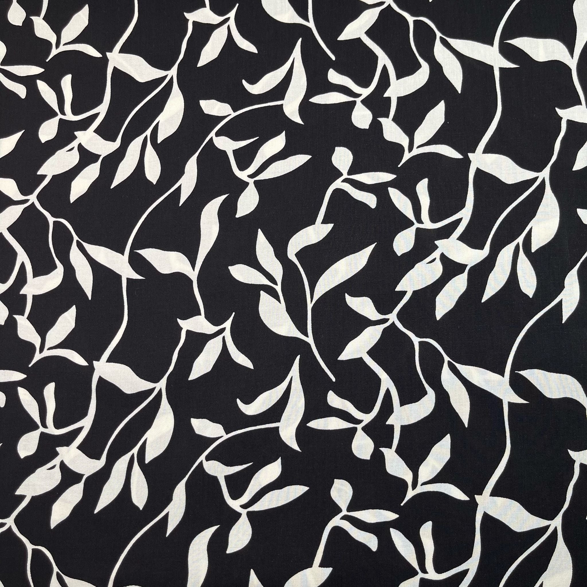 REMNANT 0.46 Metres - White Leaves on Black Viscose Fabric