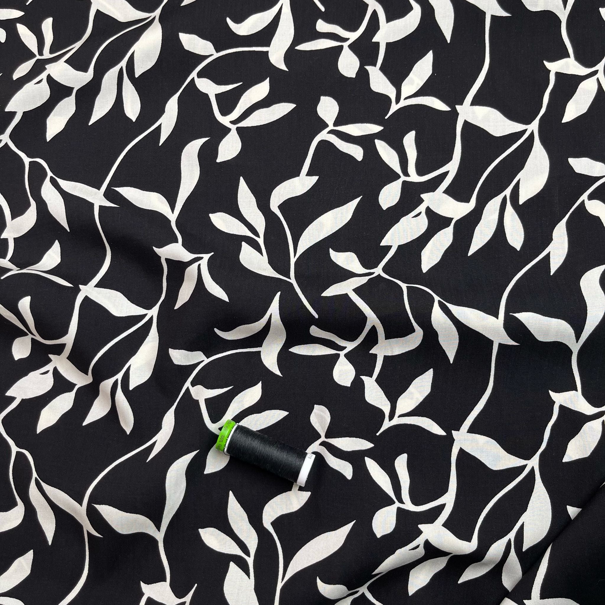 REMNANT 0.46 Metres - White Leaves on Black Viscose Fabric