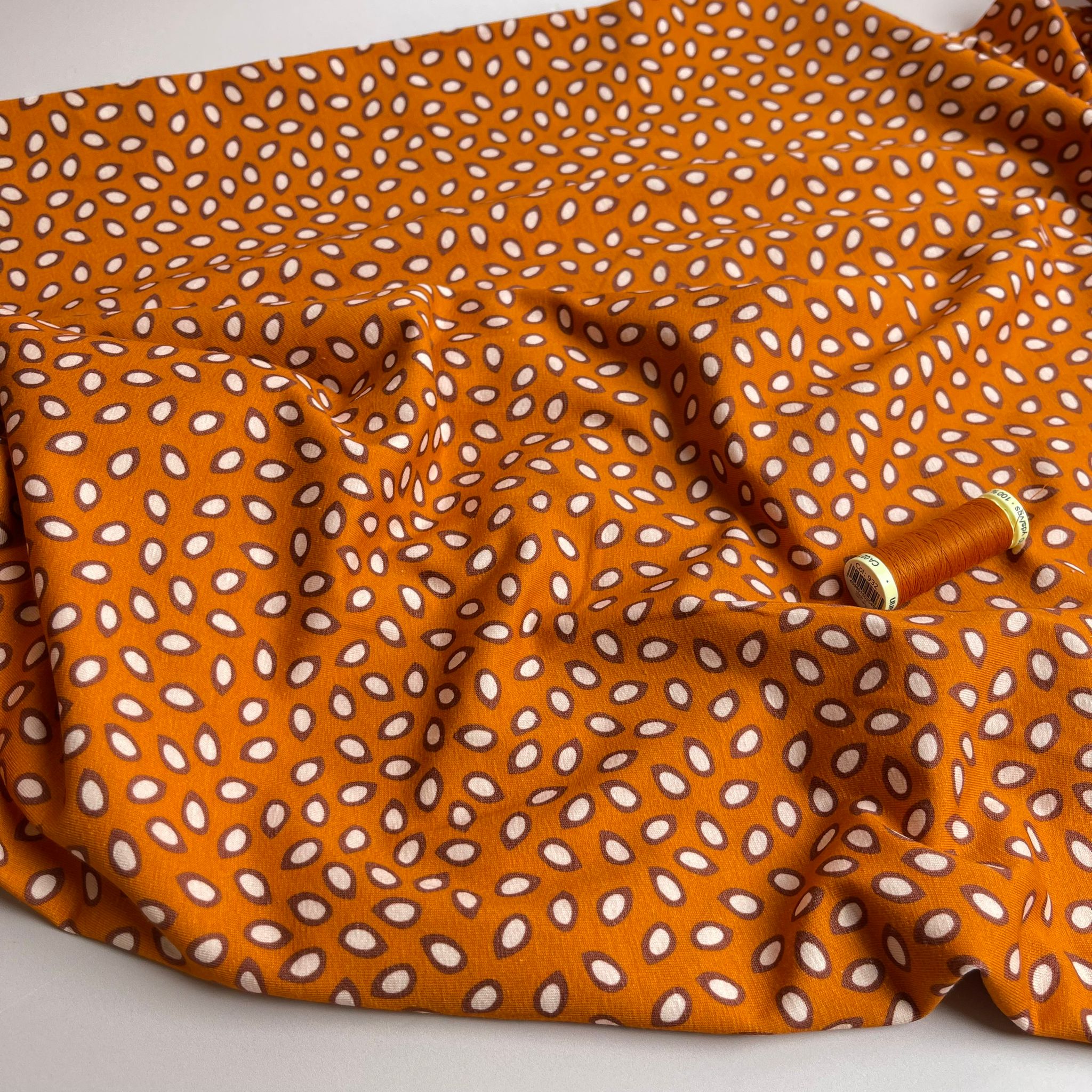 Danish Design - Small Petals on Rust Cotton Jersey Fabric