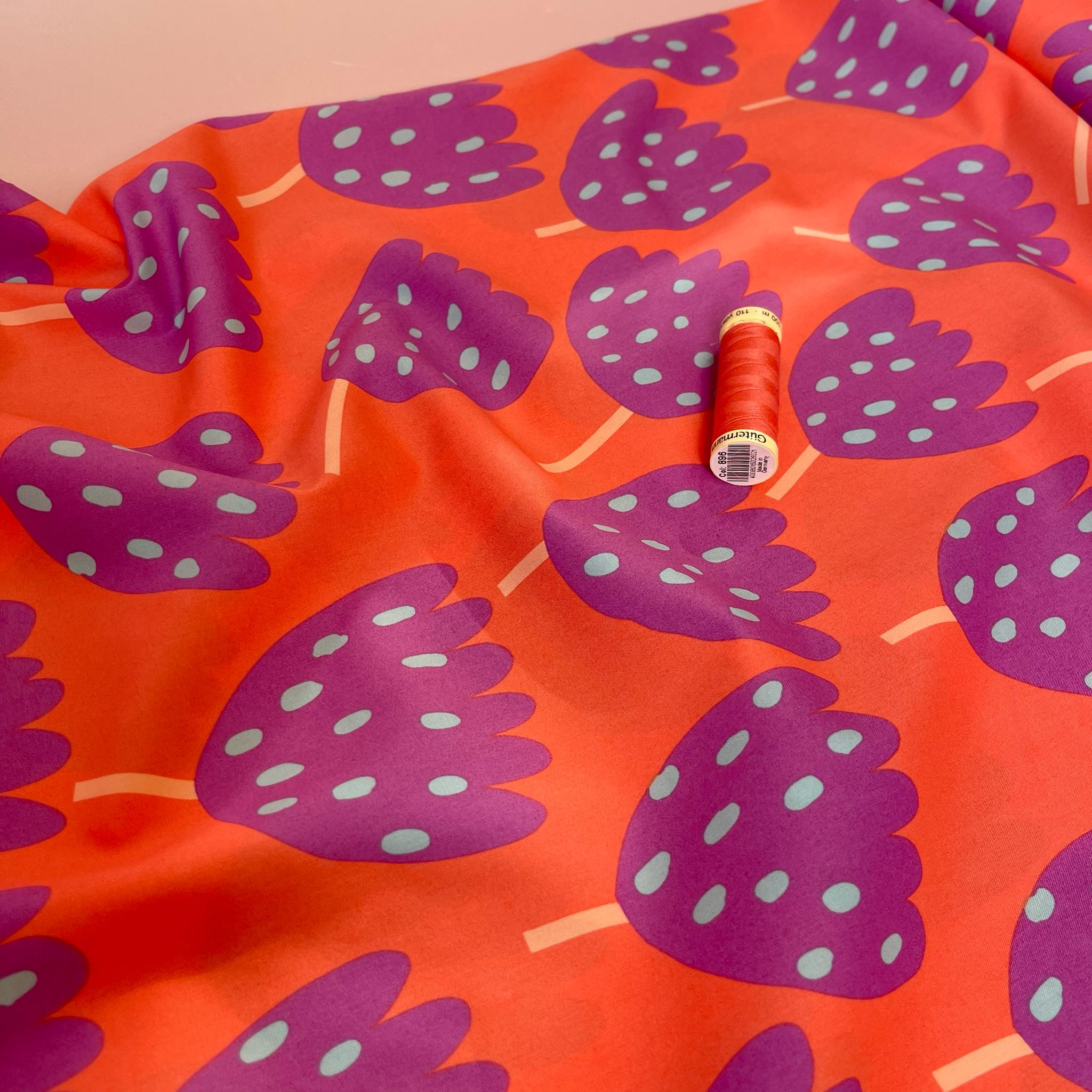 Purple Abstract Flowers on Orange Fine Cotton Poplin Fabric