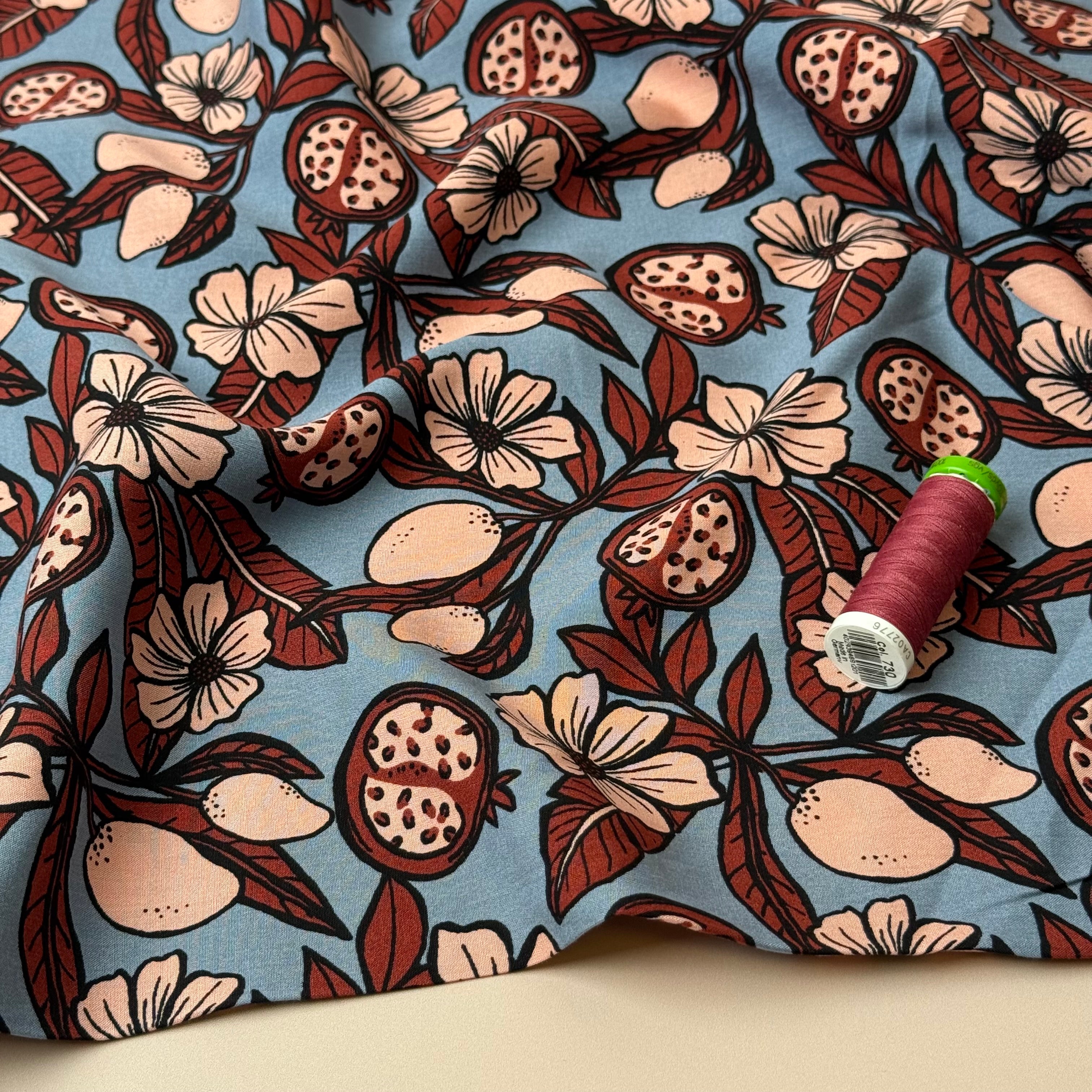Pomegranates on Dusky Blue Viscose Fabric