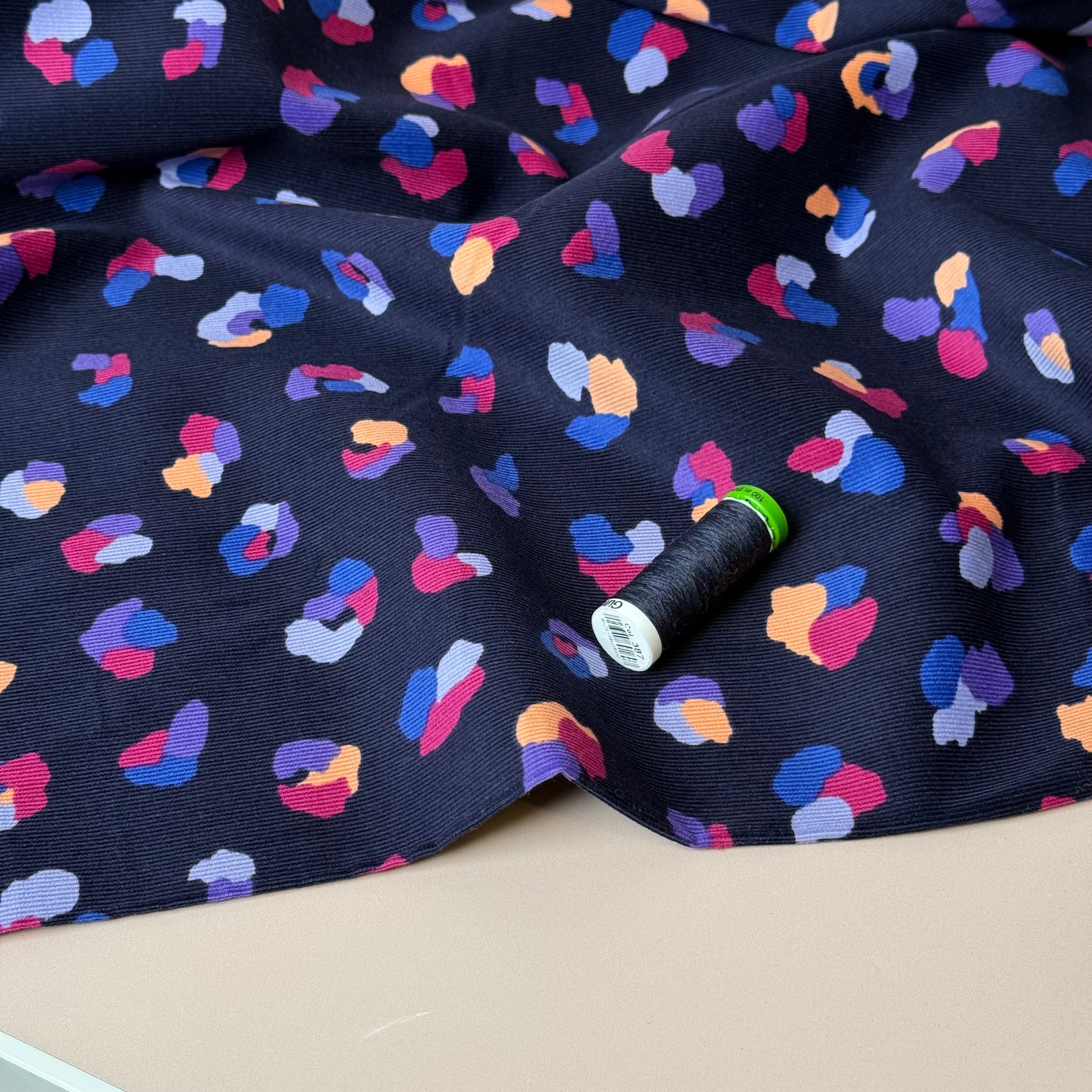 Rainbow Leopard on Navy Cotton Needlecord