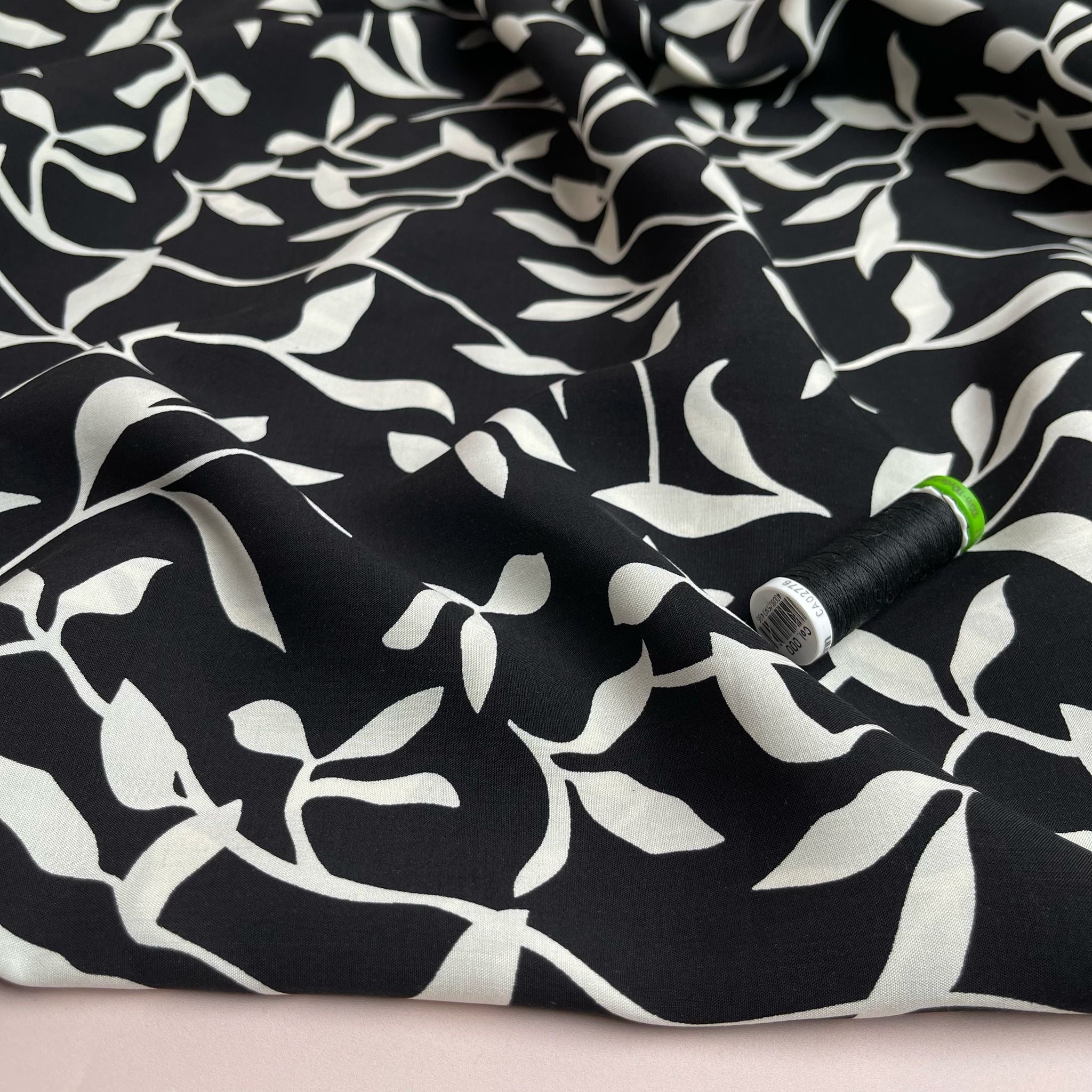 REMNANT 0.46 Metres - White Leaves on Black Viscose Fabric