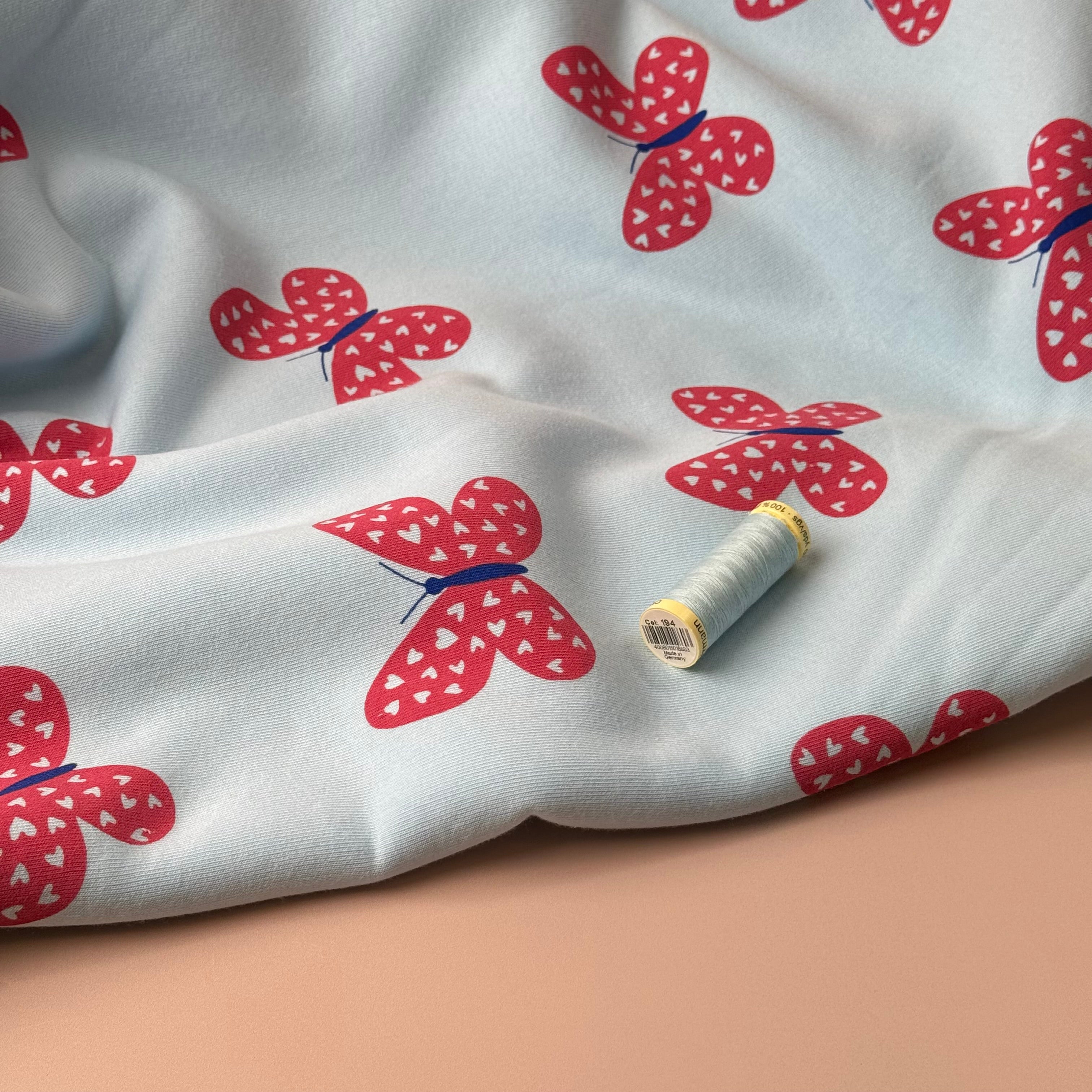 Butterflies on Icy Blue Soft Cotton Sweat-shirting Fabric