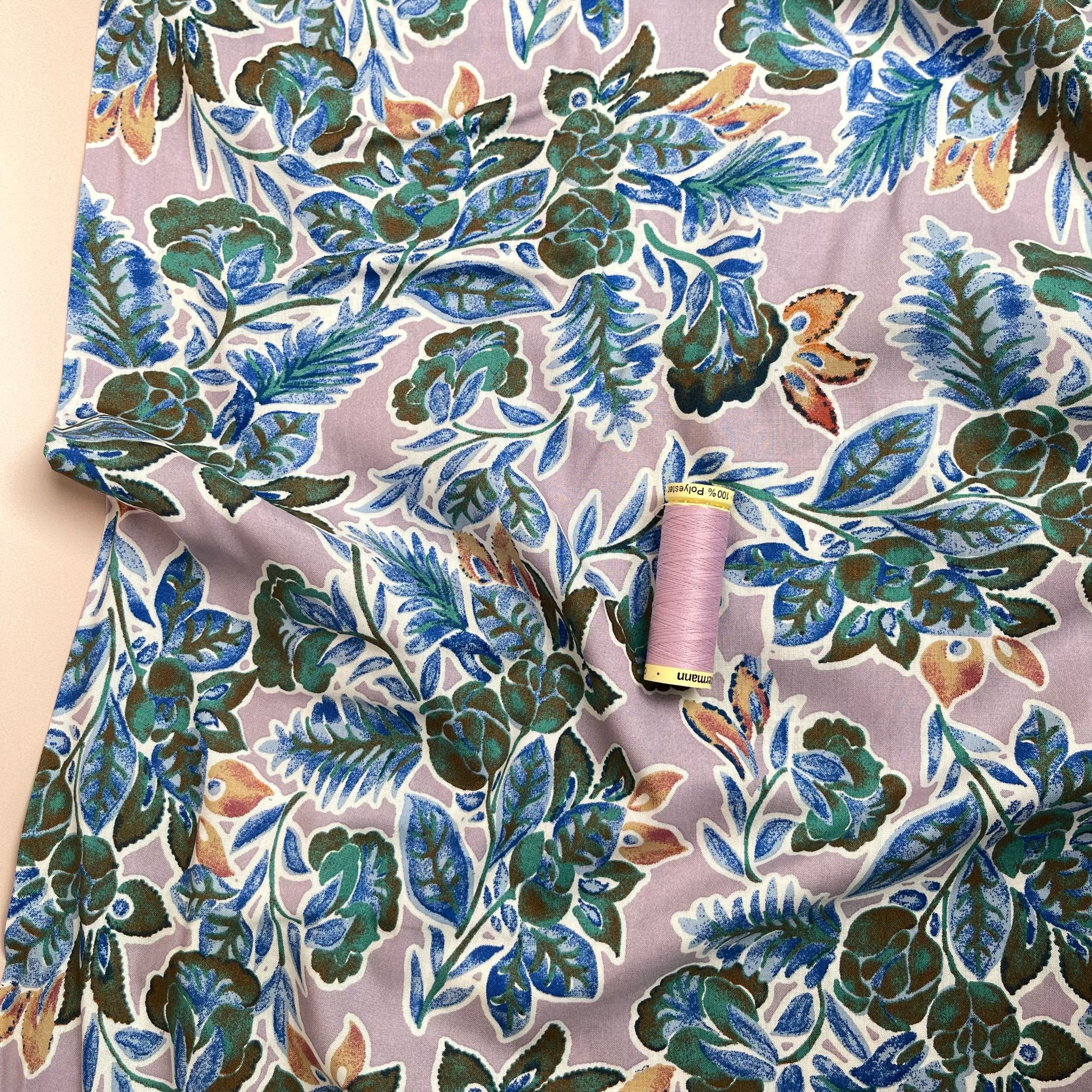 Green Foliage on Mauve Viscose Fabric