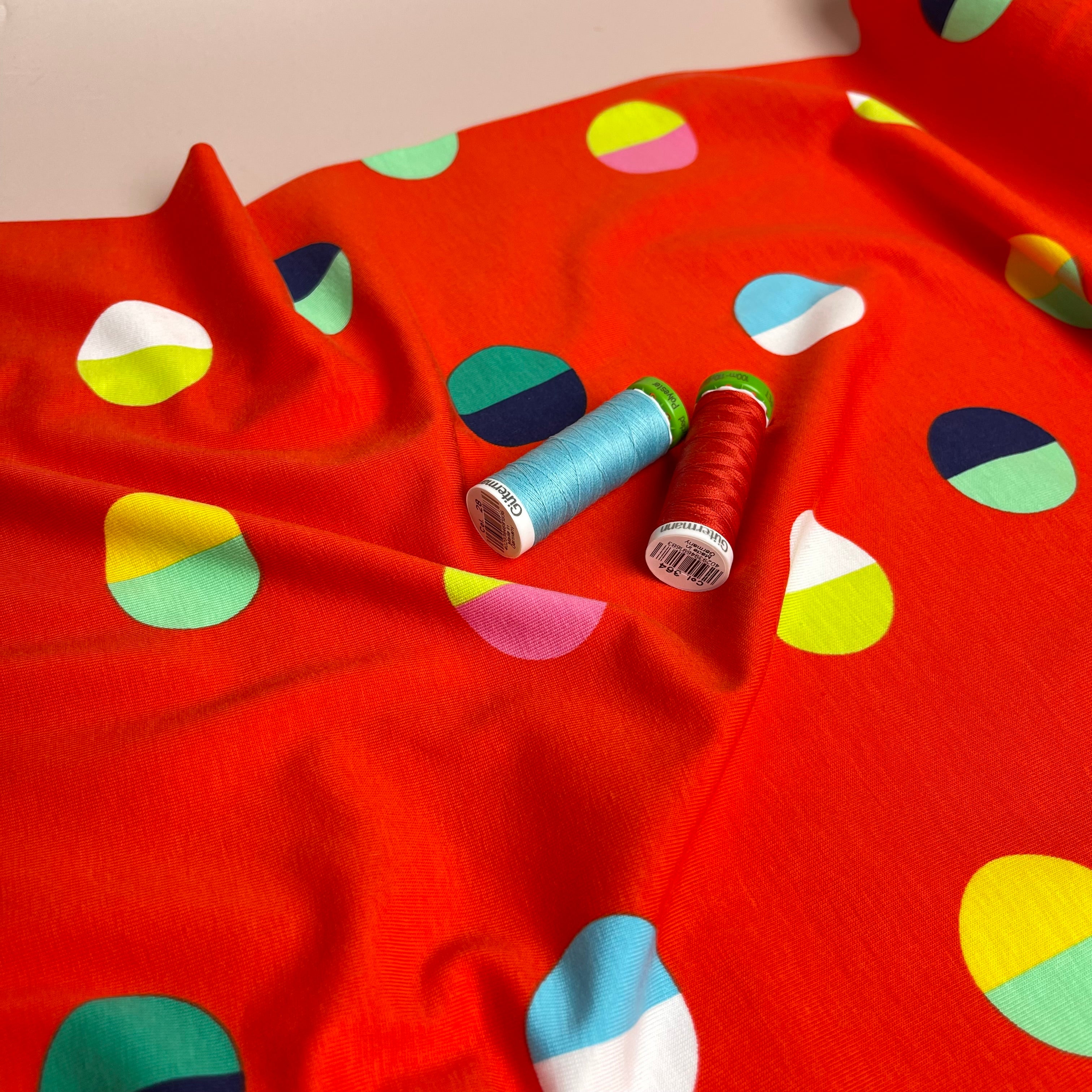 Split Circles on Red Cotton Jersey Fabric