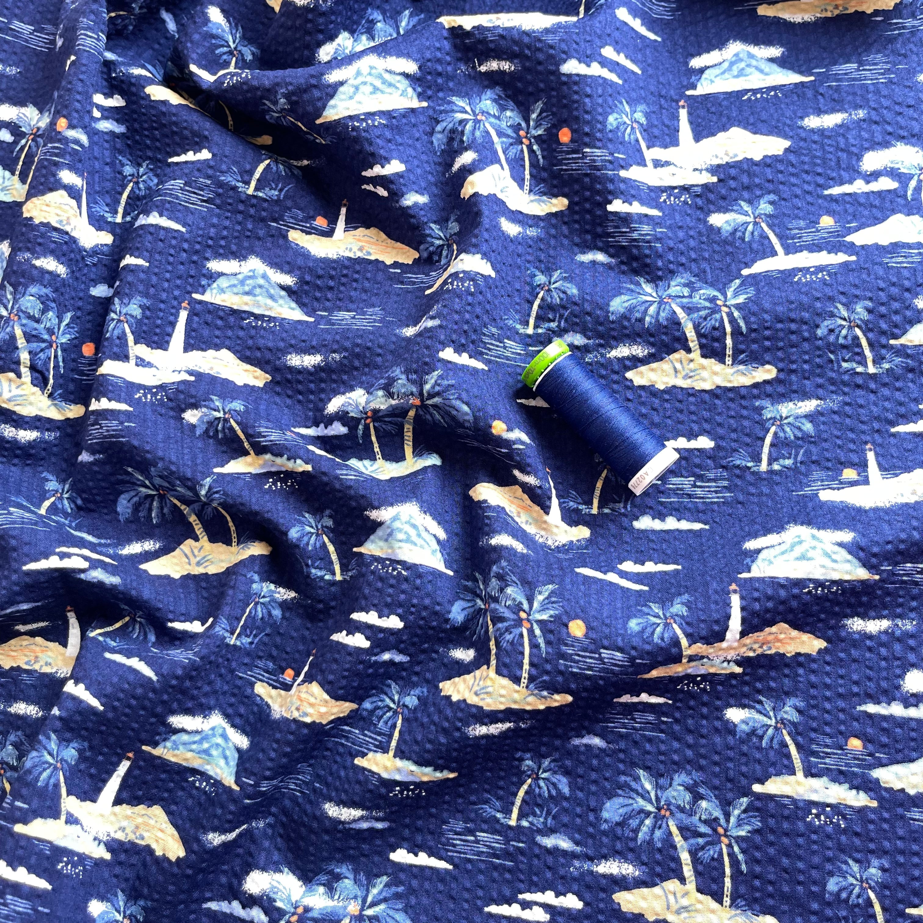 Holiday Islands on Navy Cotton Seersucker Fabric