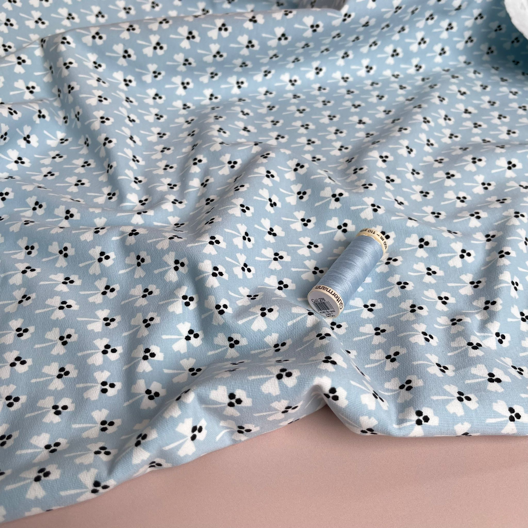 REMNANT 1.27 metres + free 14cm fault - Monochrome Clovers on Pale Blue Cotton French Terry