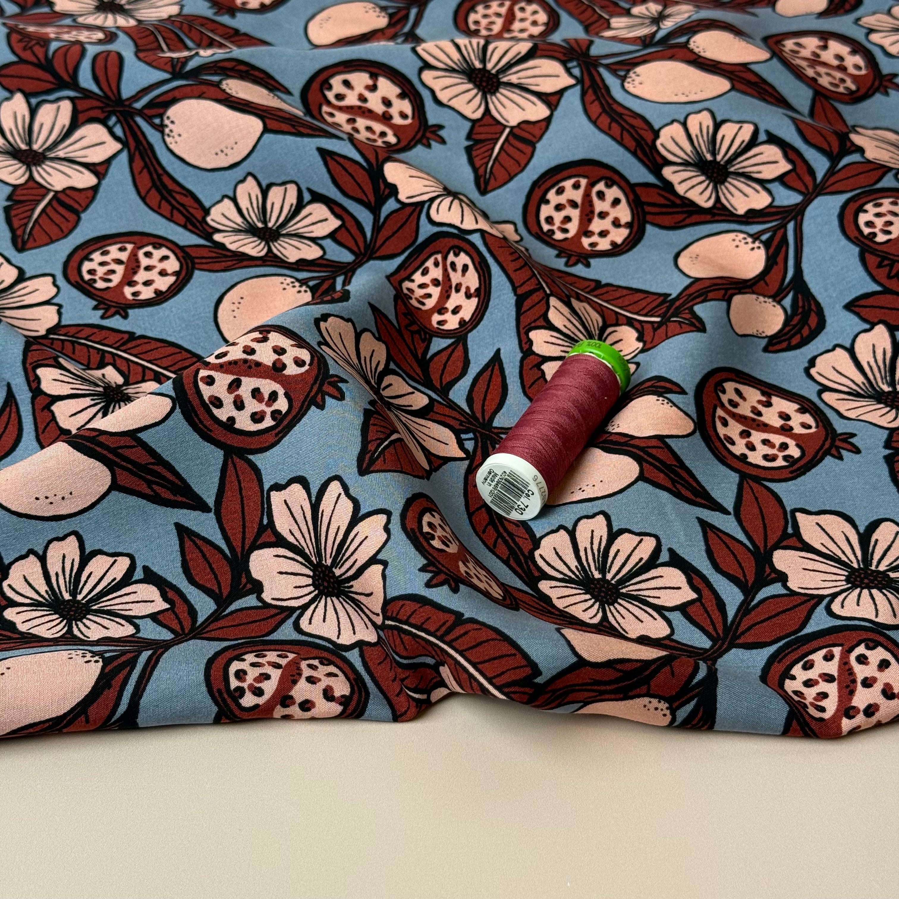 Pomegranates on Dusky Blue Viscose Fabric