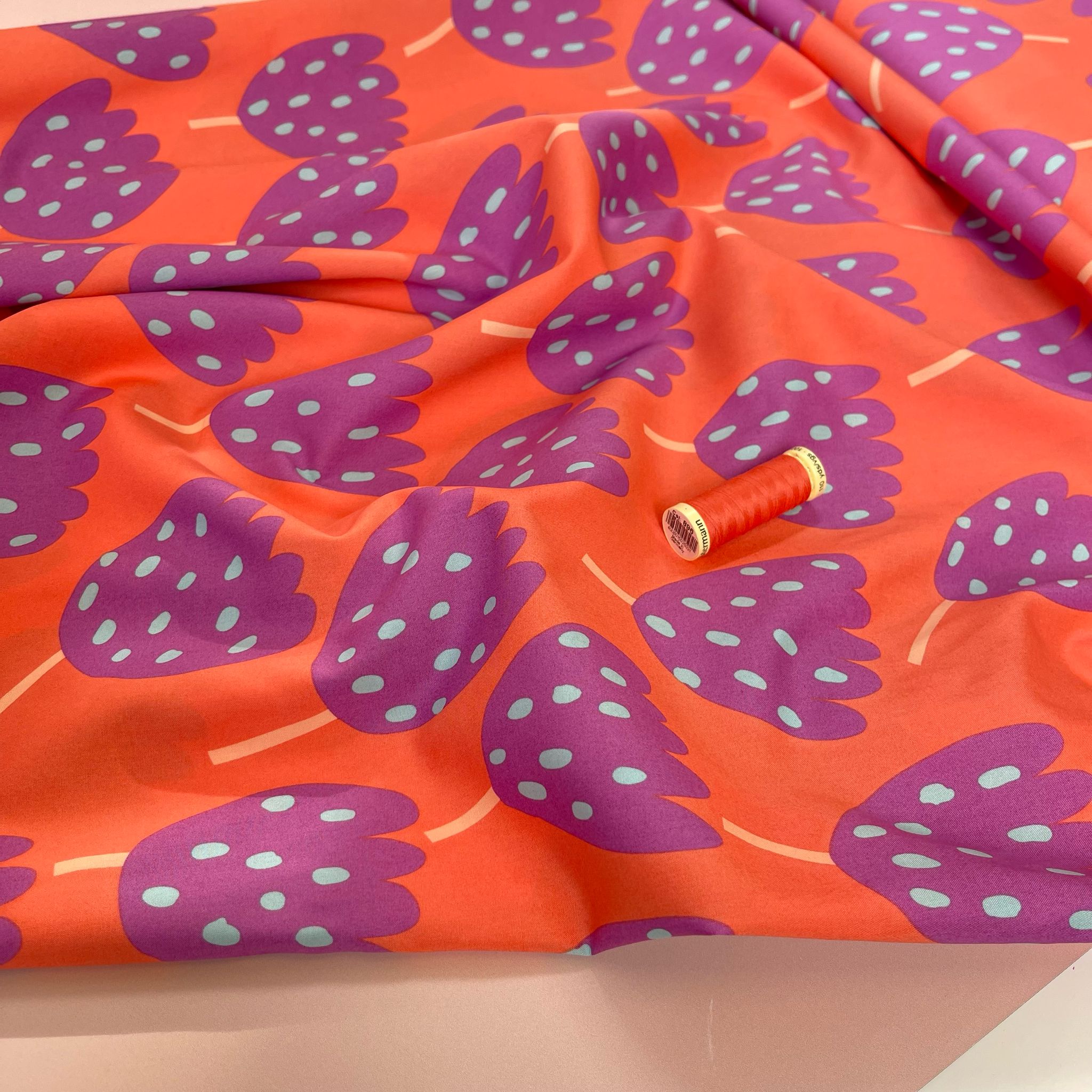 Purple Abstract Flowers on Orange Fine Cotton Poplin Fabric