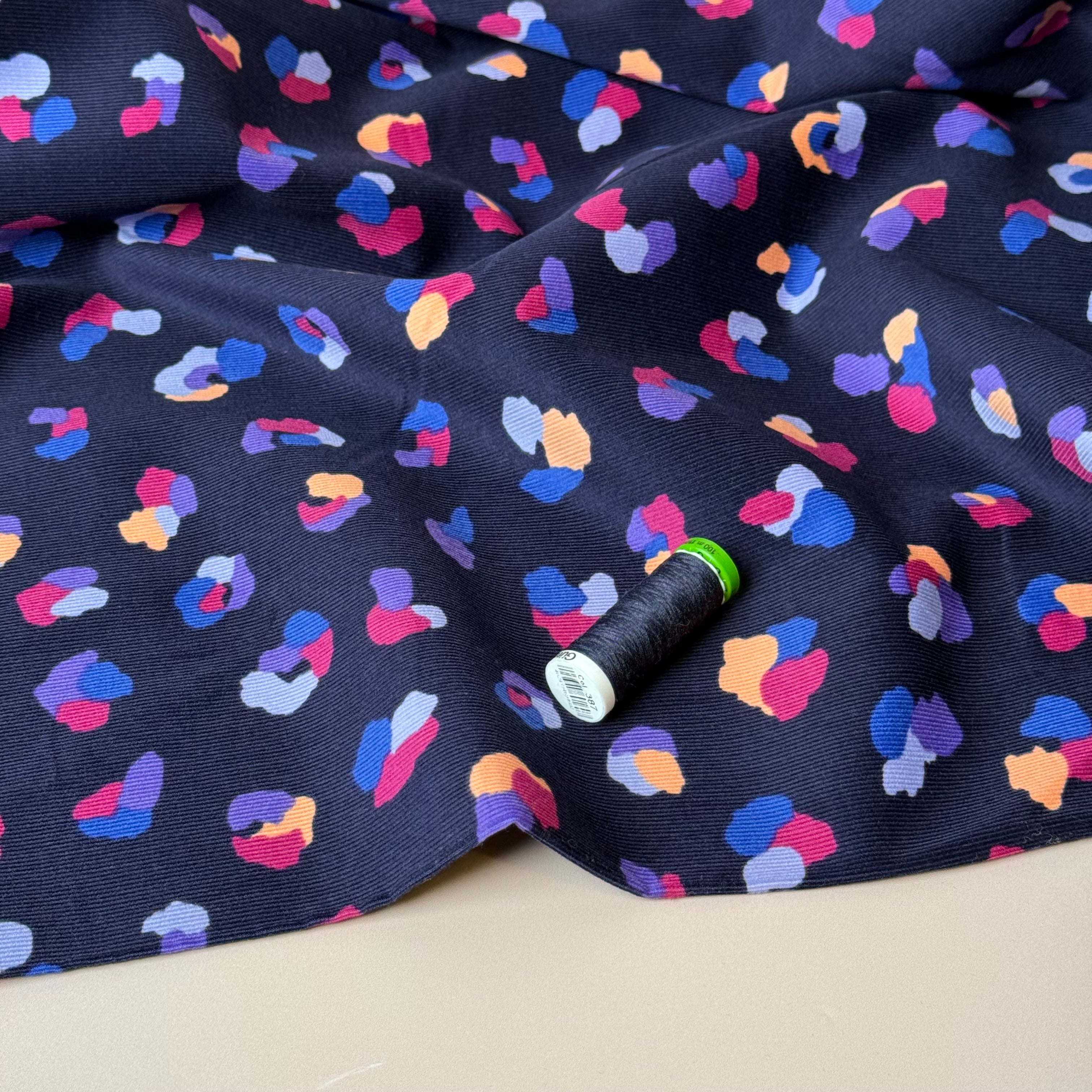 Rainbow Leopard on Navy Cotton Needlecord