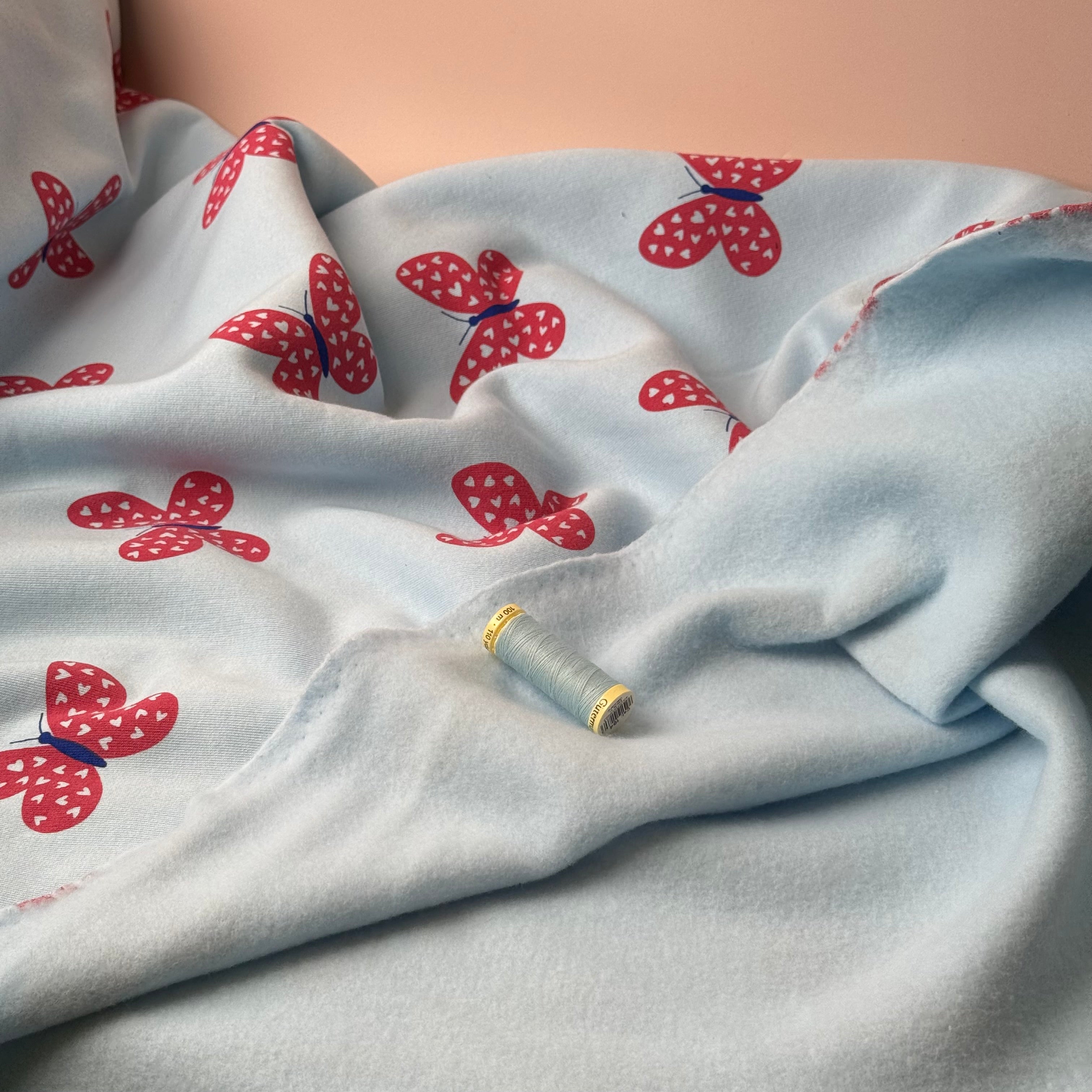 Butterflies on Icy Blue Soft Cotton Sweat-shirting Fabric