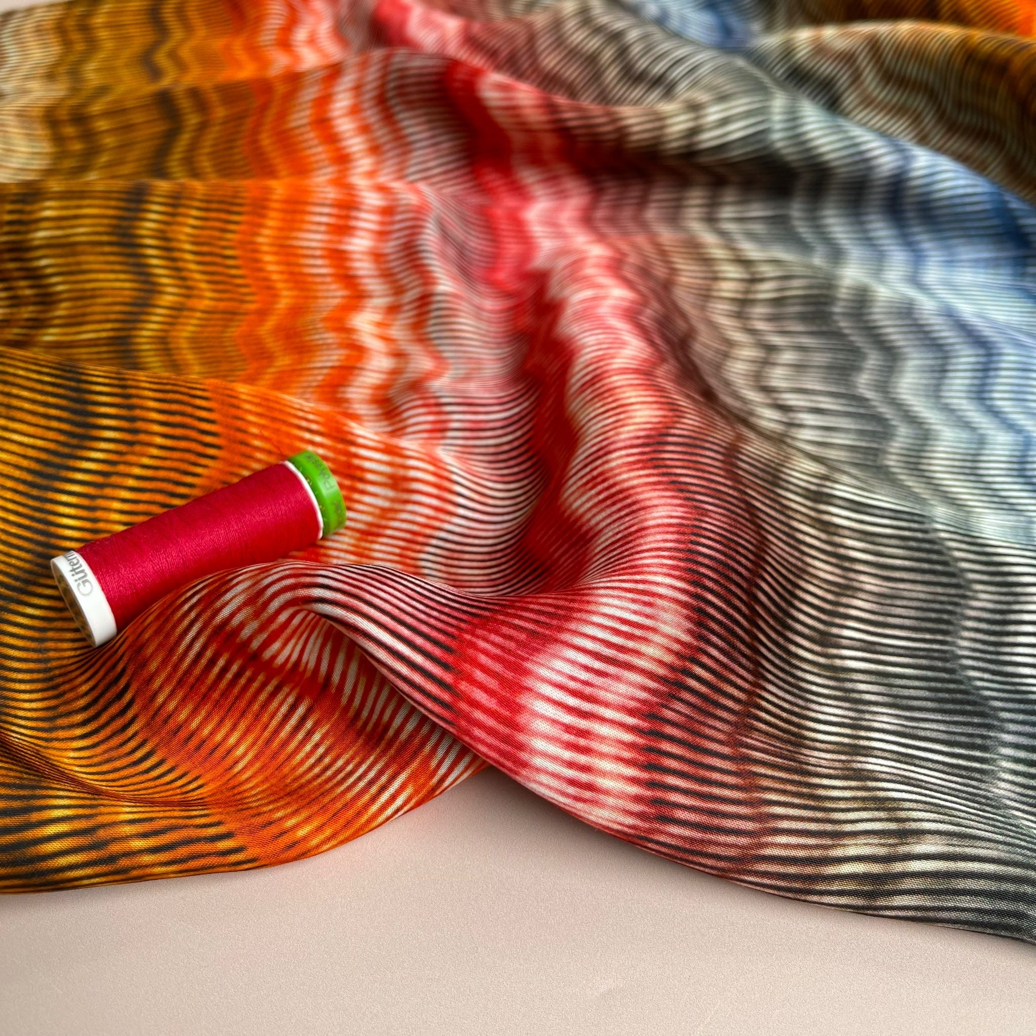 Hazy Waves in Sunset Viscose Sateen Fabric