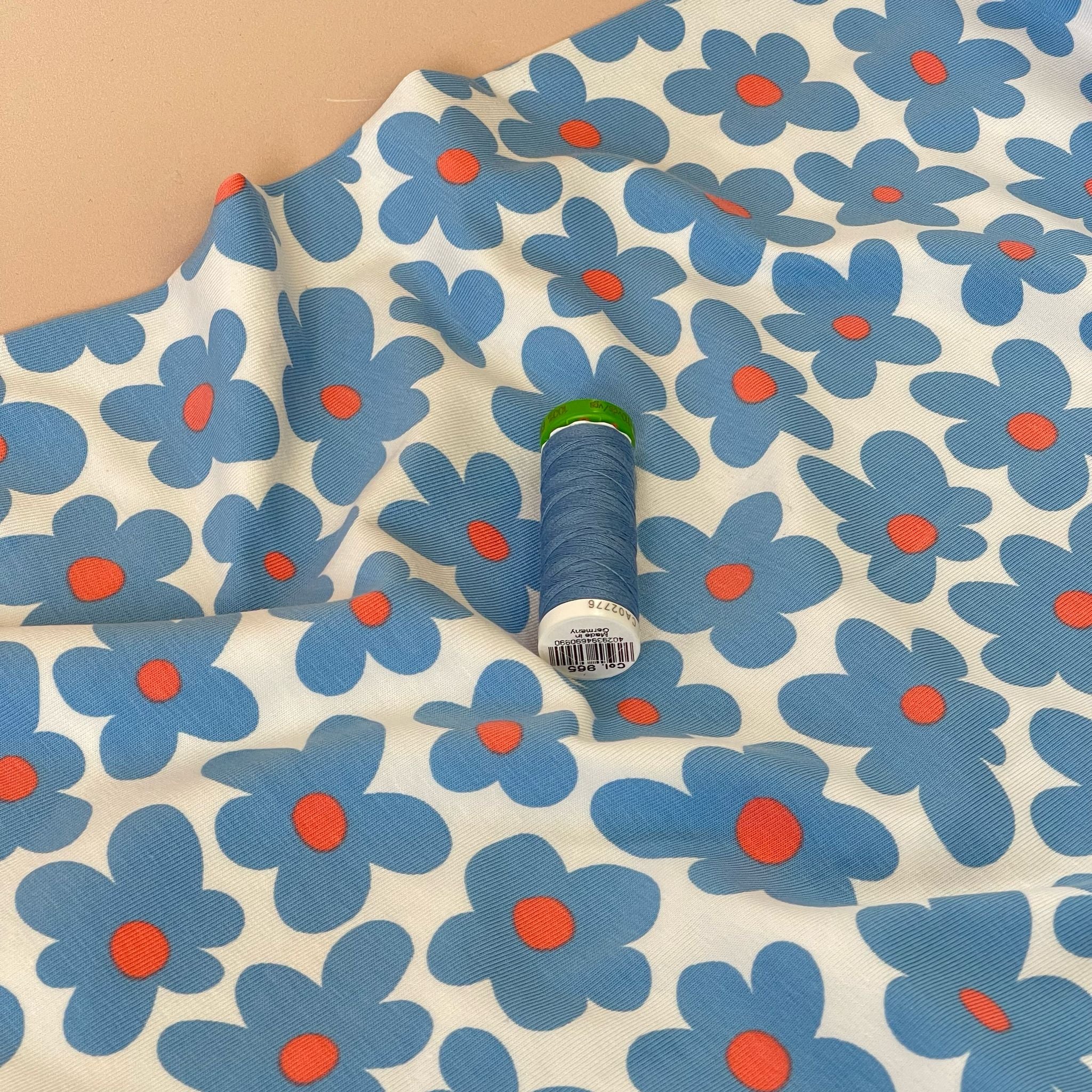 Fun Flowers in Blue Cotton Jersey Fabric