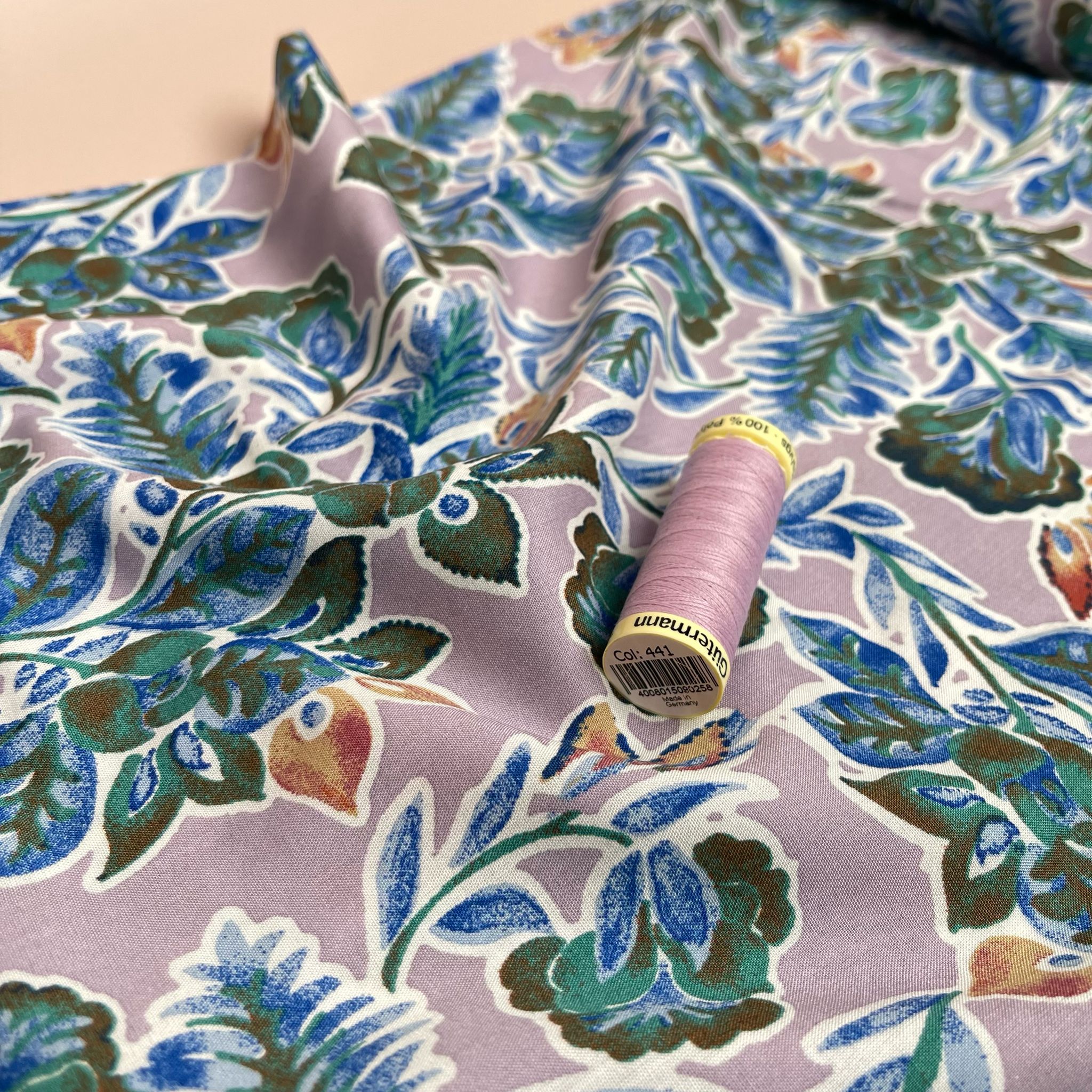 Green Foliage on Mauve Viscose Fabric