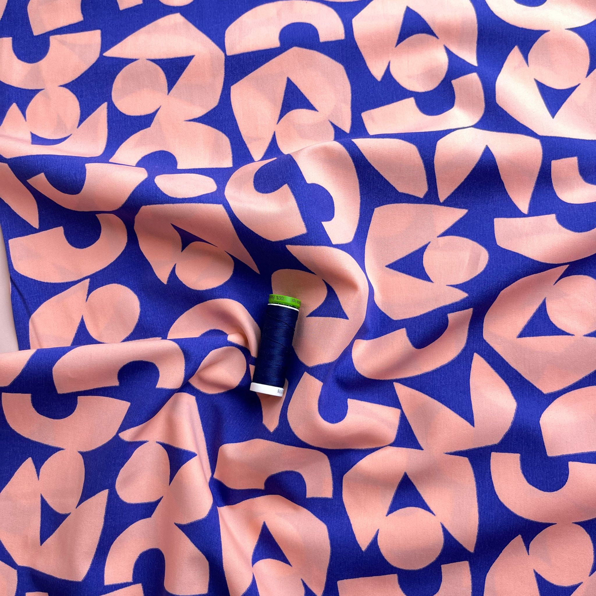 Blush Shapes on Blue Cotton Poplin Fabric