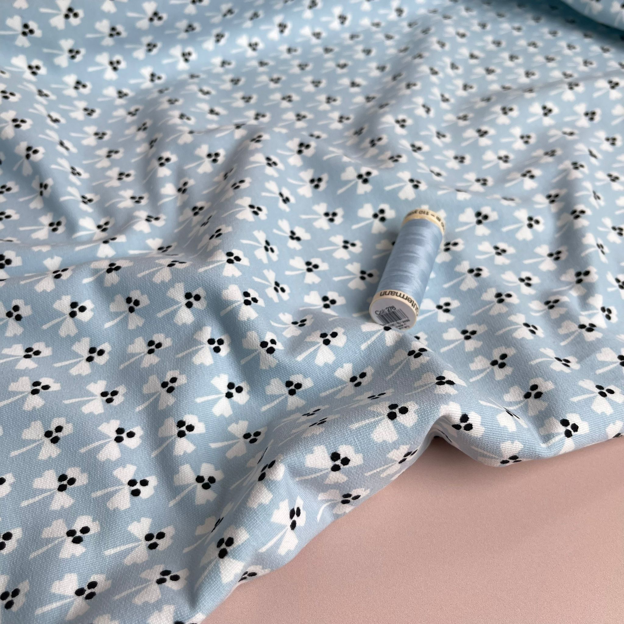REMNANT 1.27 metres + free 14cm fault - Monochrome Clovers on Pale Blue Cotton French Terry