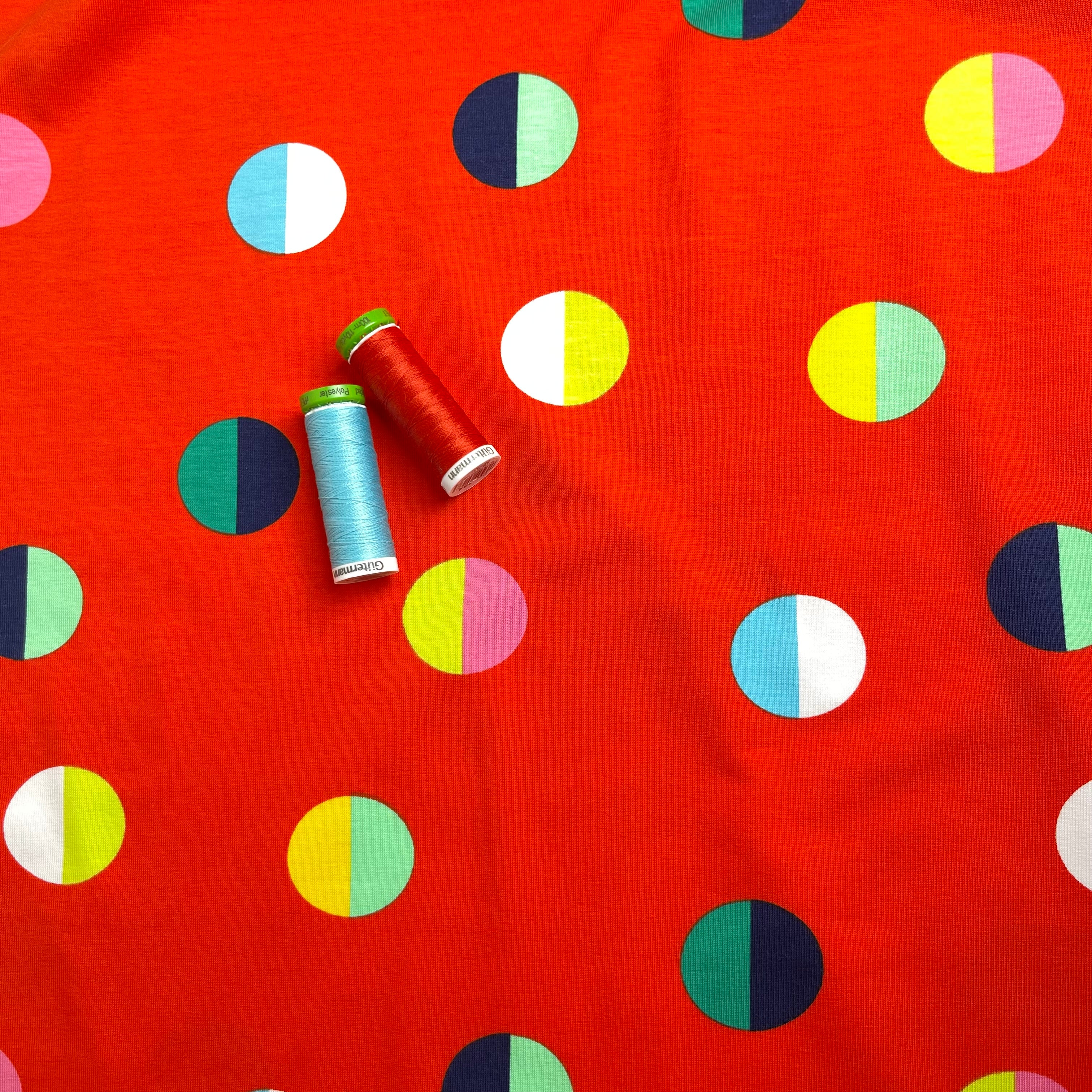 Split Circles on Red Cotton Jersey Fabric