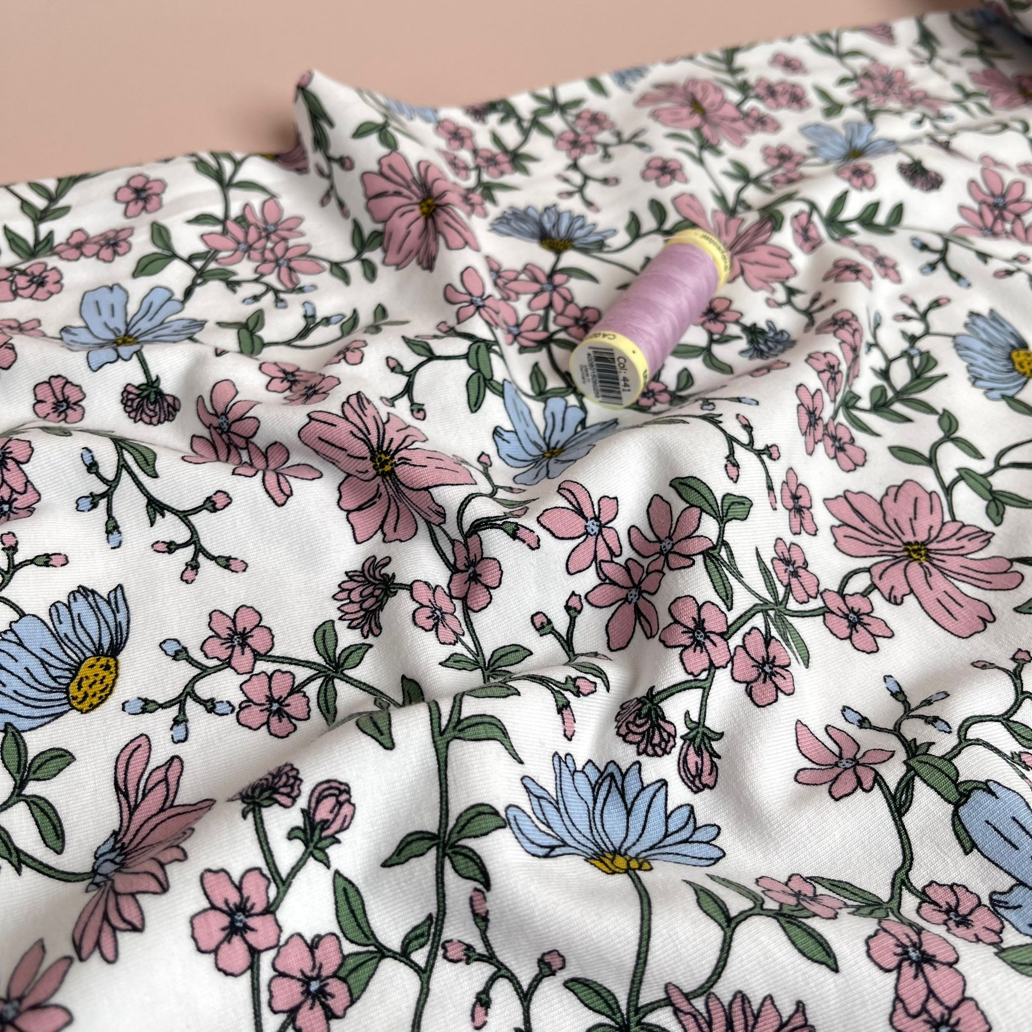 Pink Flowers on White Cotton Jersey Fabric