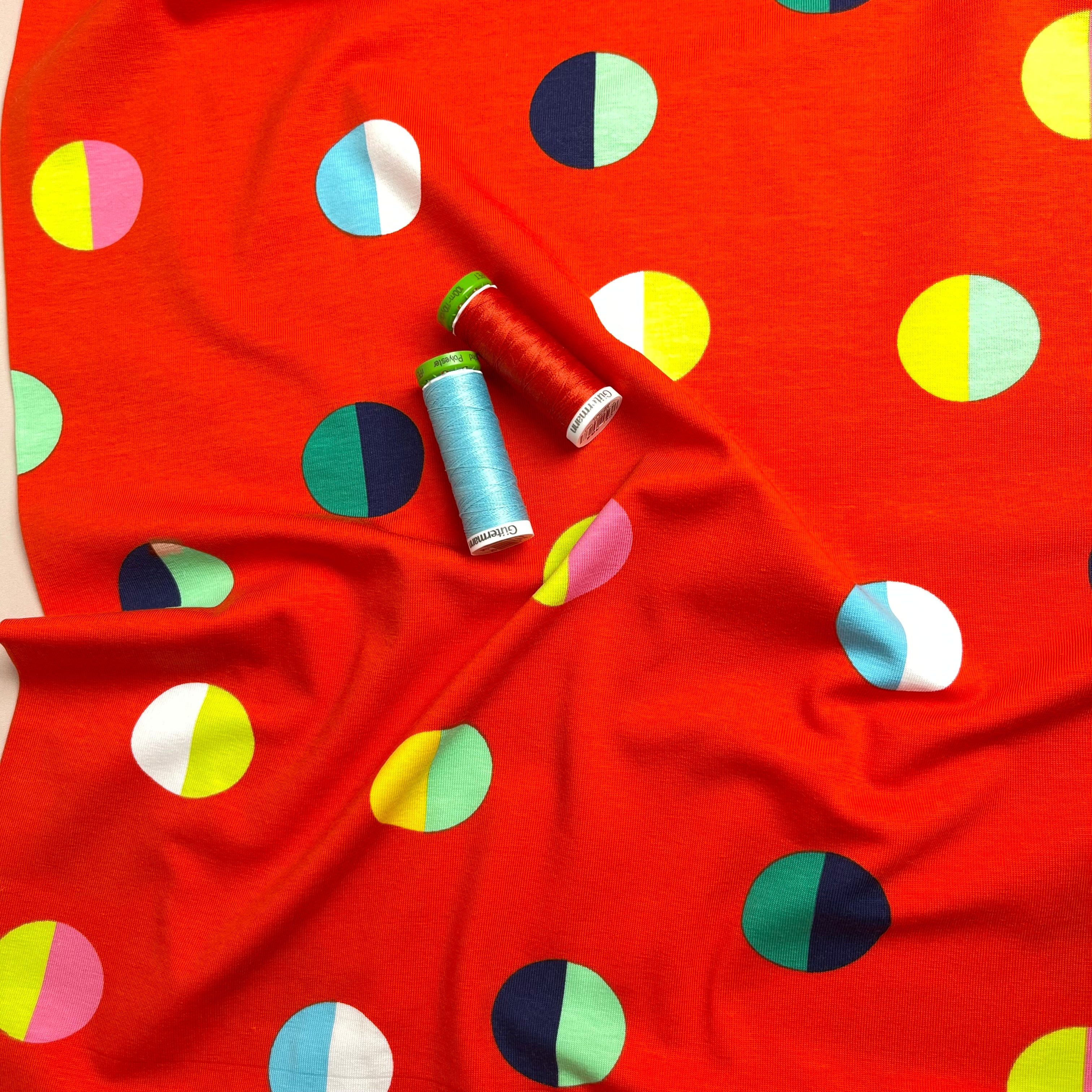 Split Circles on Red Cotton Jersey Fabric