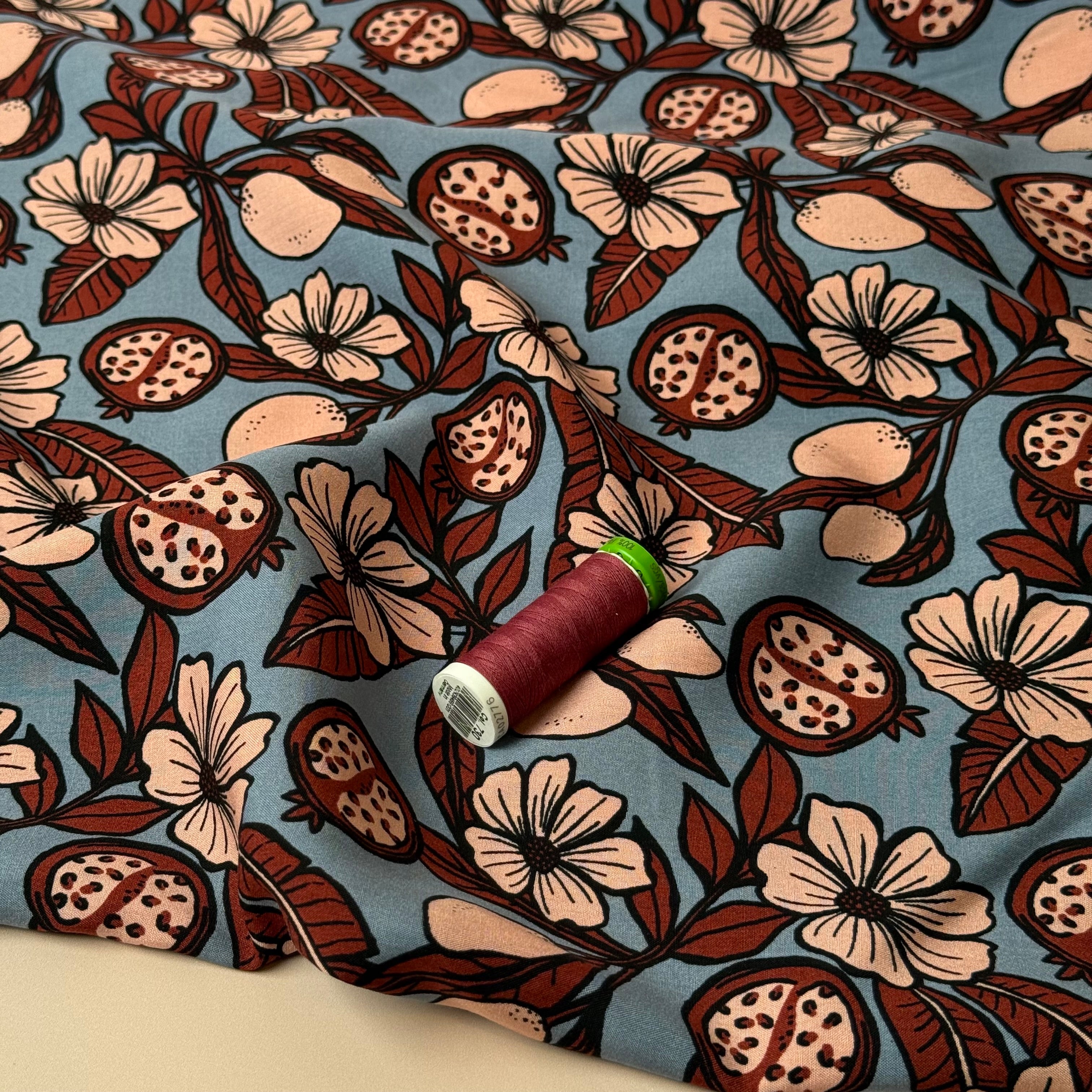 Pomegranates on Dusky Blue Viscose Fabric