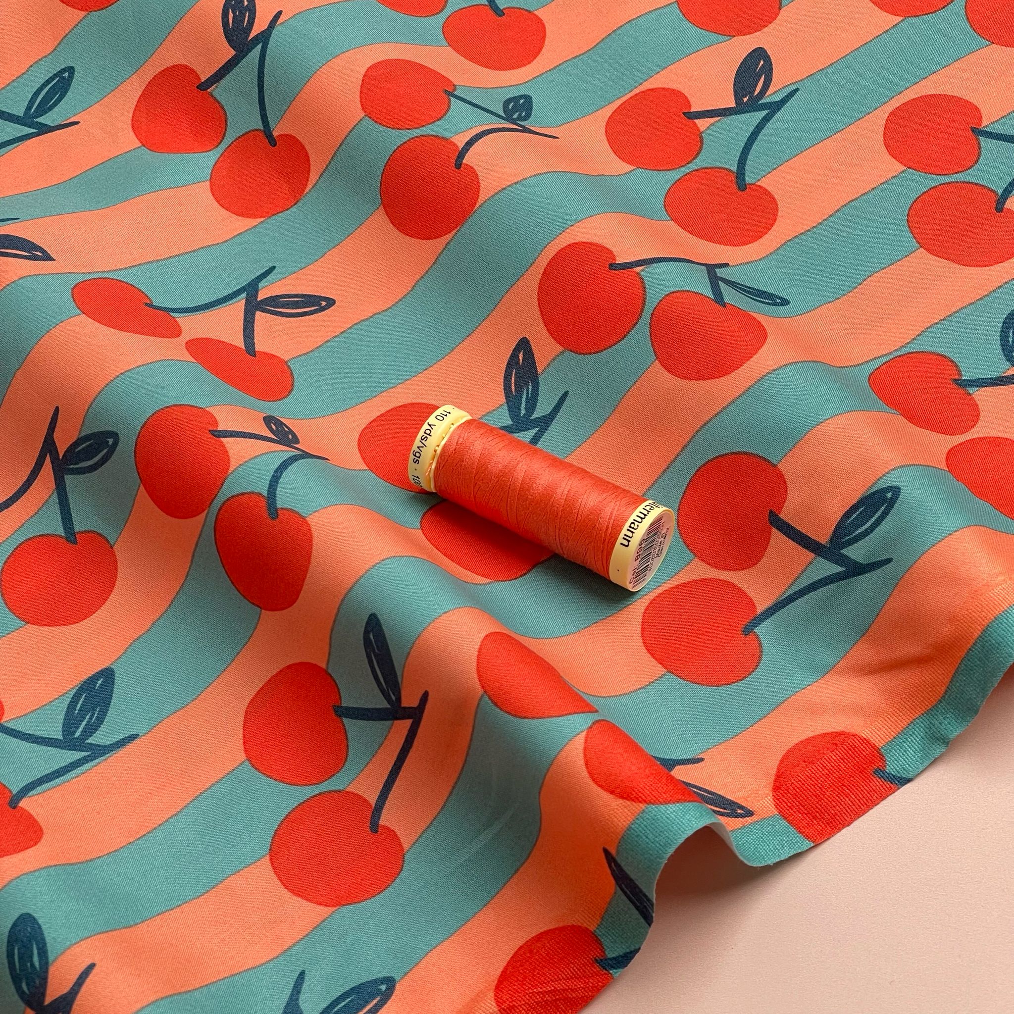 Funky Cherry Stripes on Turquoise Cotton Poplin Fabric