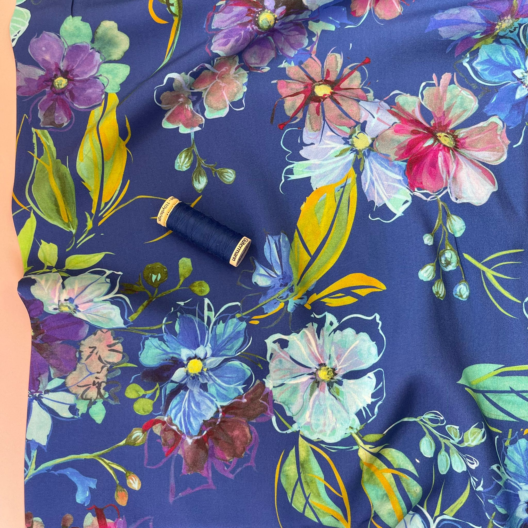 Painted Blooms on Blue Viscose Fabric
