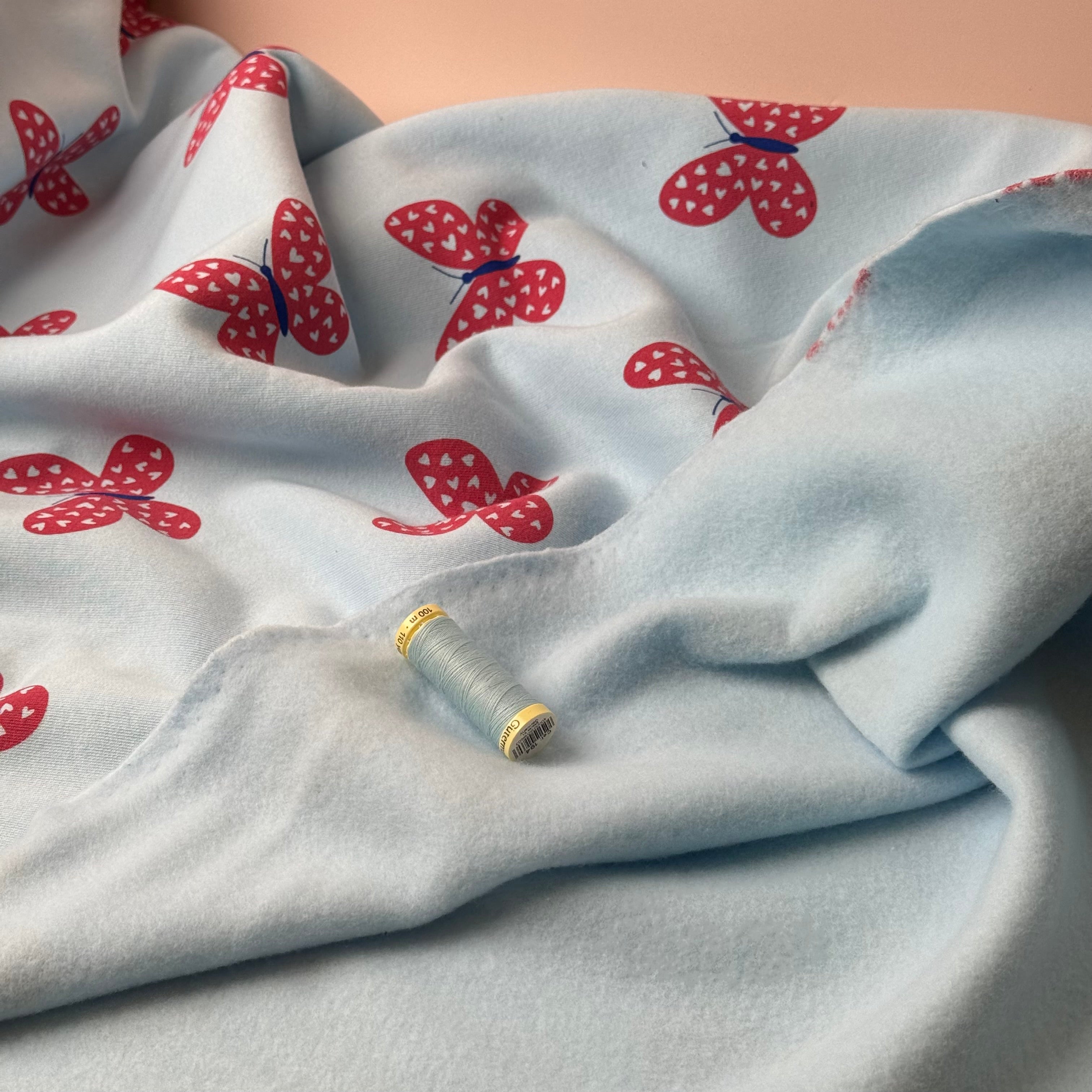 Butterflies on Icy Blue Soft Cotton Sweat-shirting Fabric