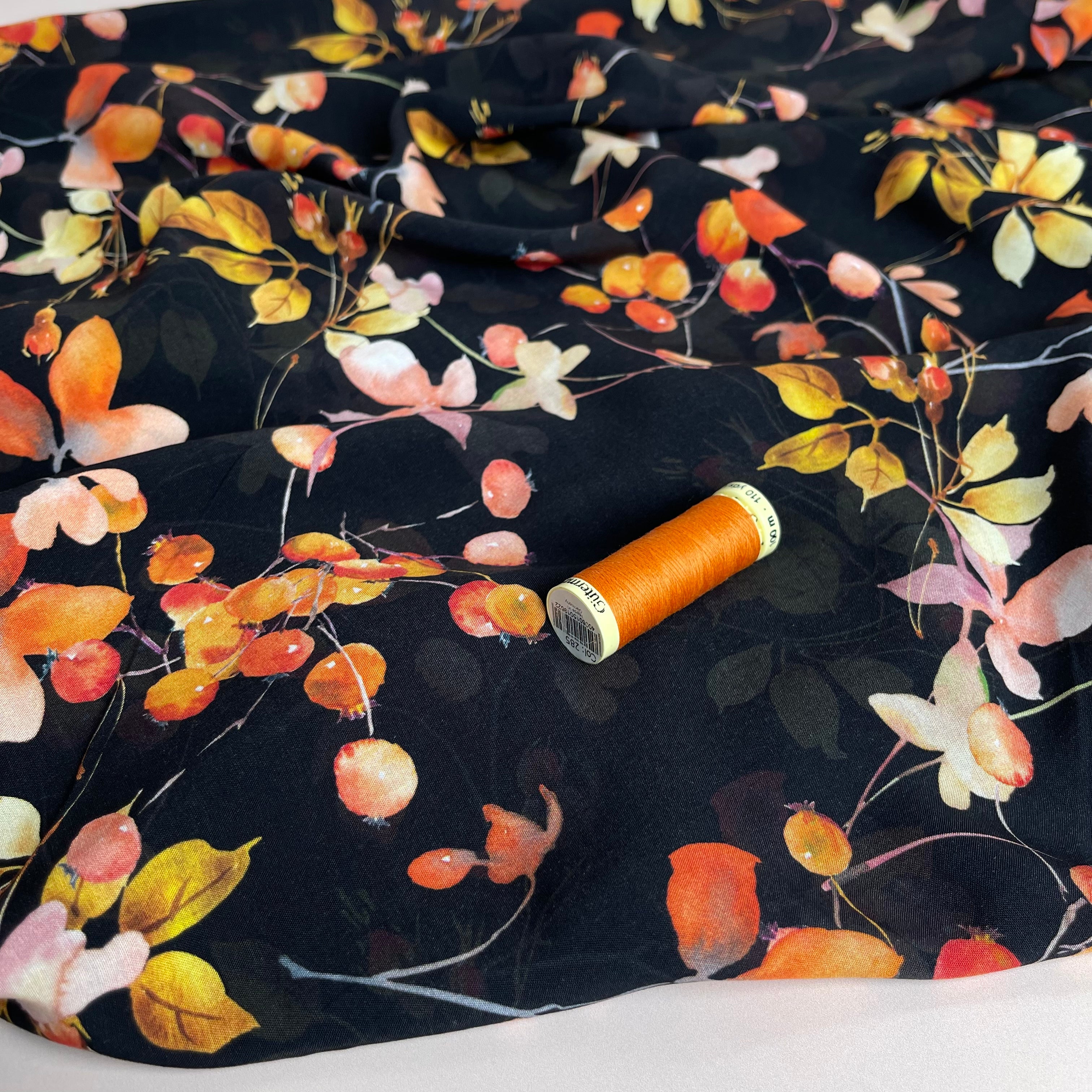 Winter Berries on Black Viscose Fabric