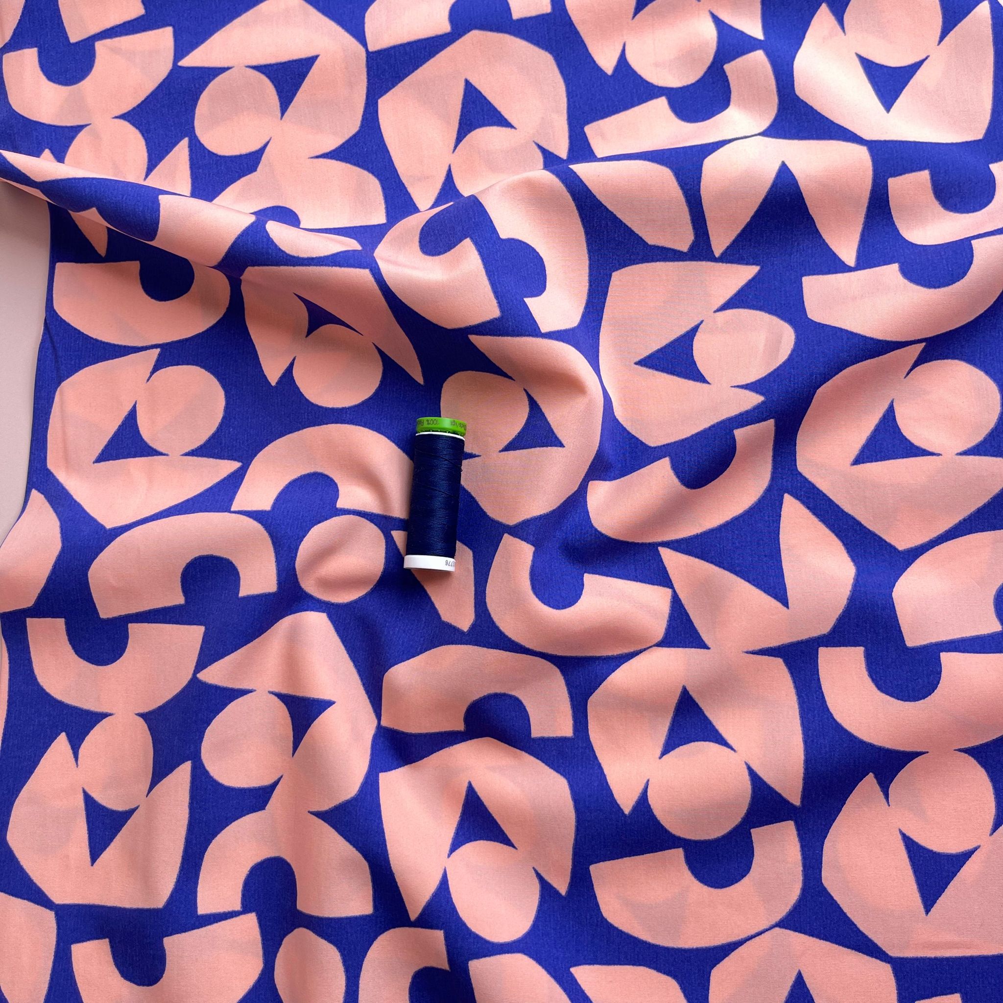 Blush Shapes on Blue Cotton Poplin Fabric