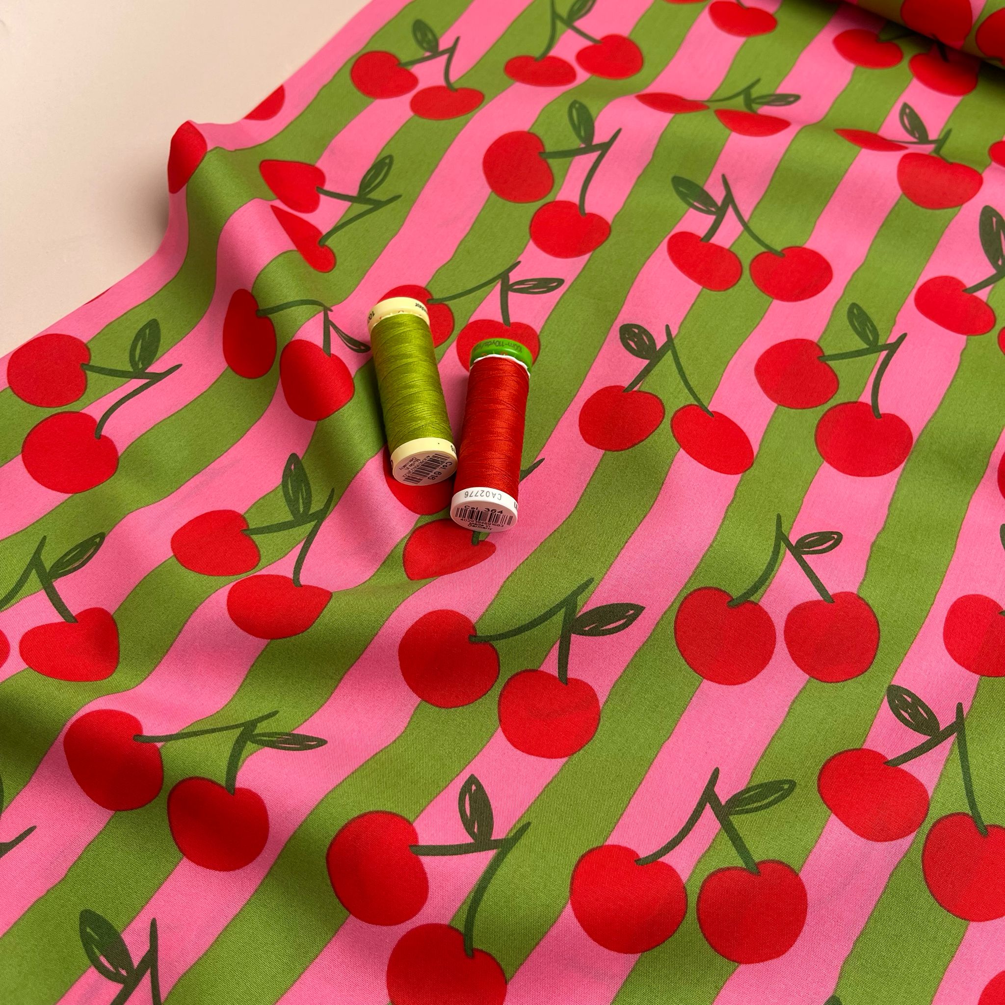 Funky Cherry Stripes on Pink Cotton Poplin Fabric