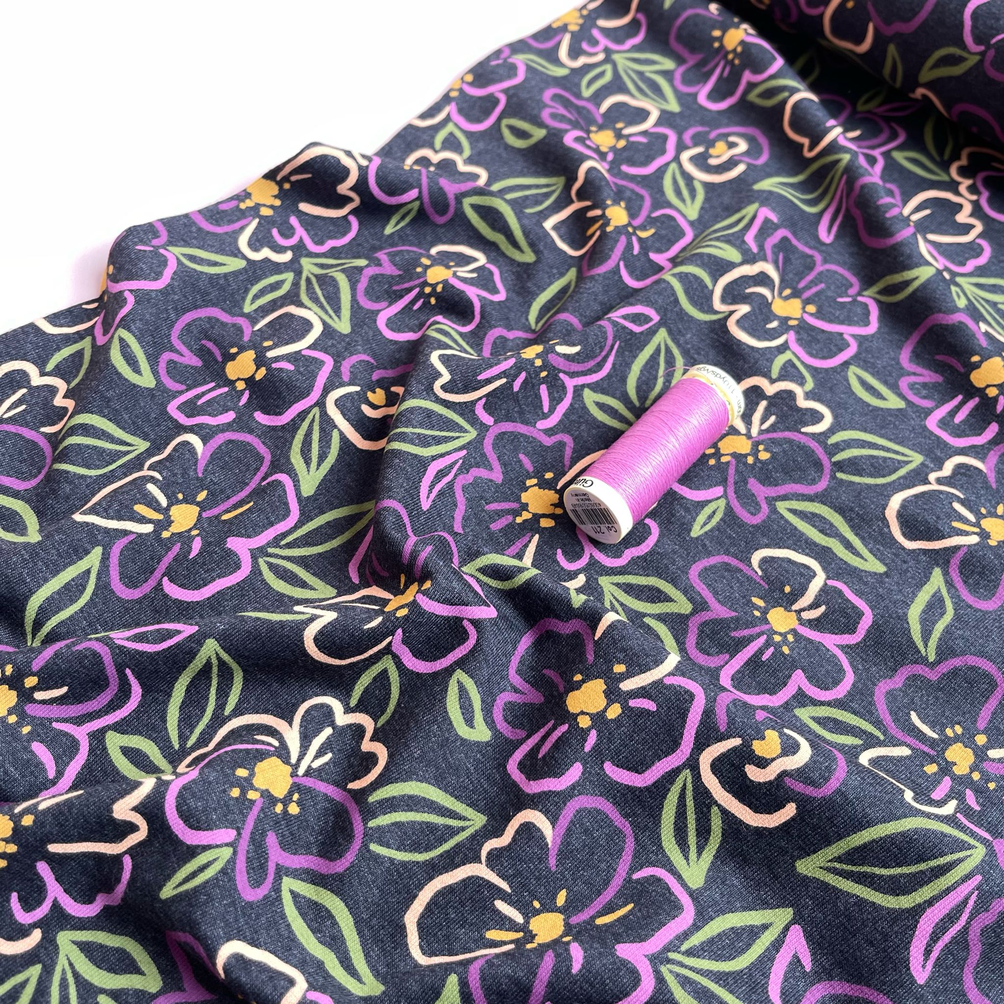 Floral Outline on Dark Grey Melange Jersey Fabric