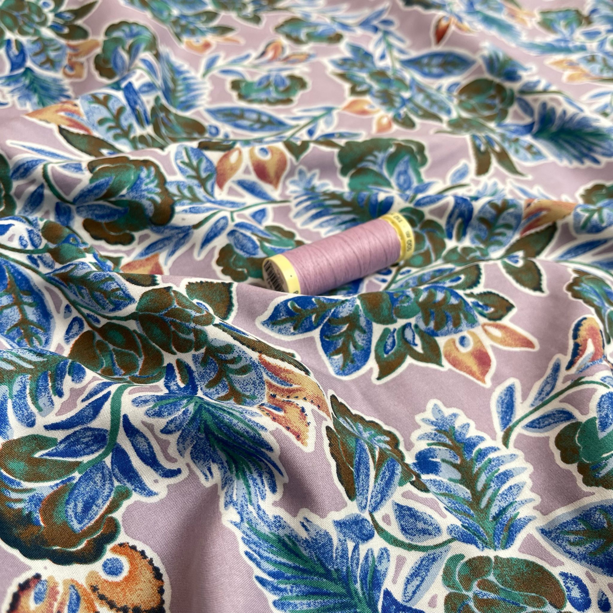 Green Foliage on Mauve Viscose Fabric