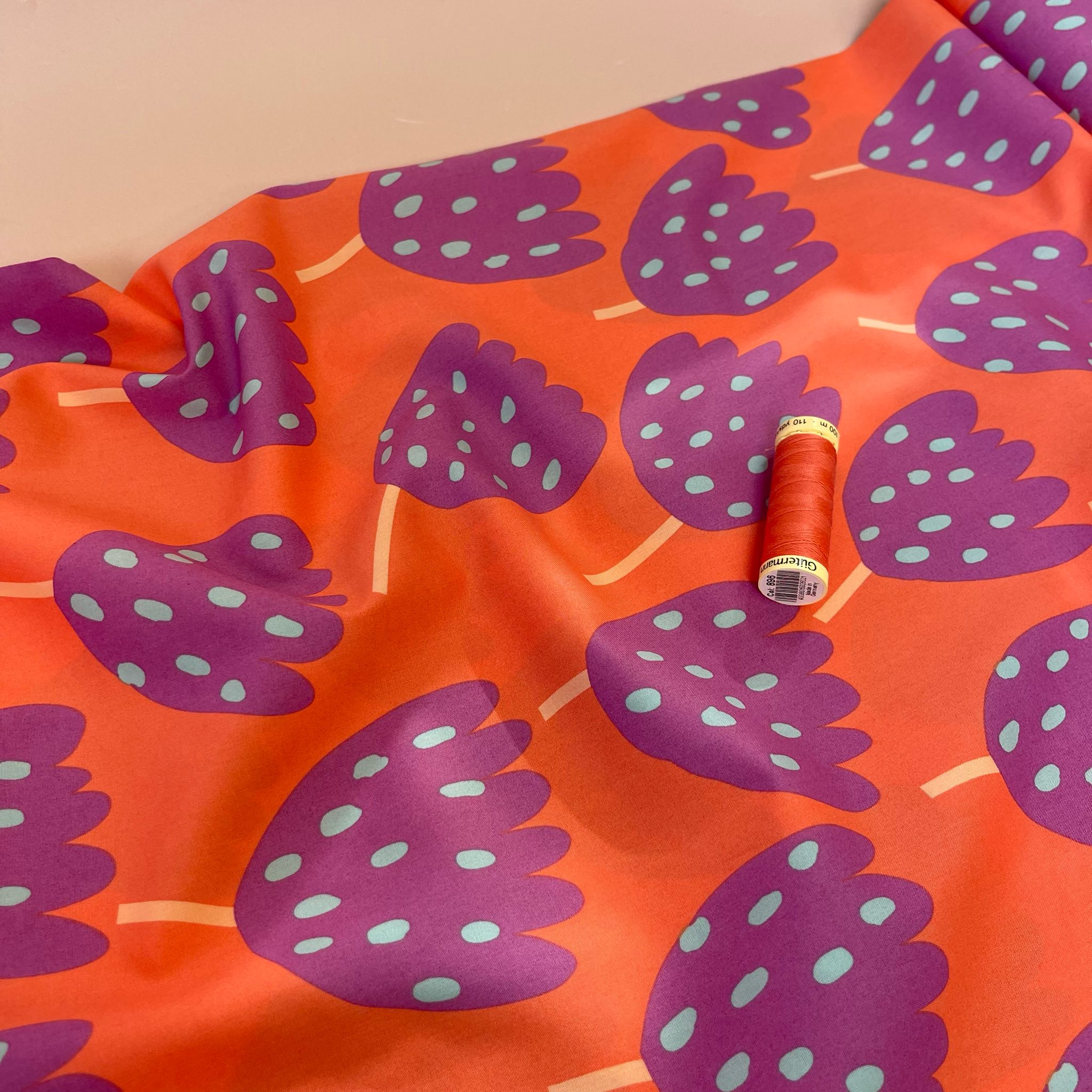 Purple Abstract Flowers on Orange Fine Cotton Poplin Fabric