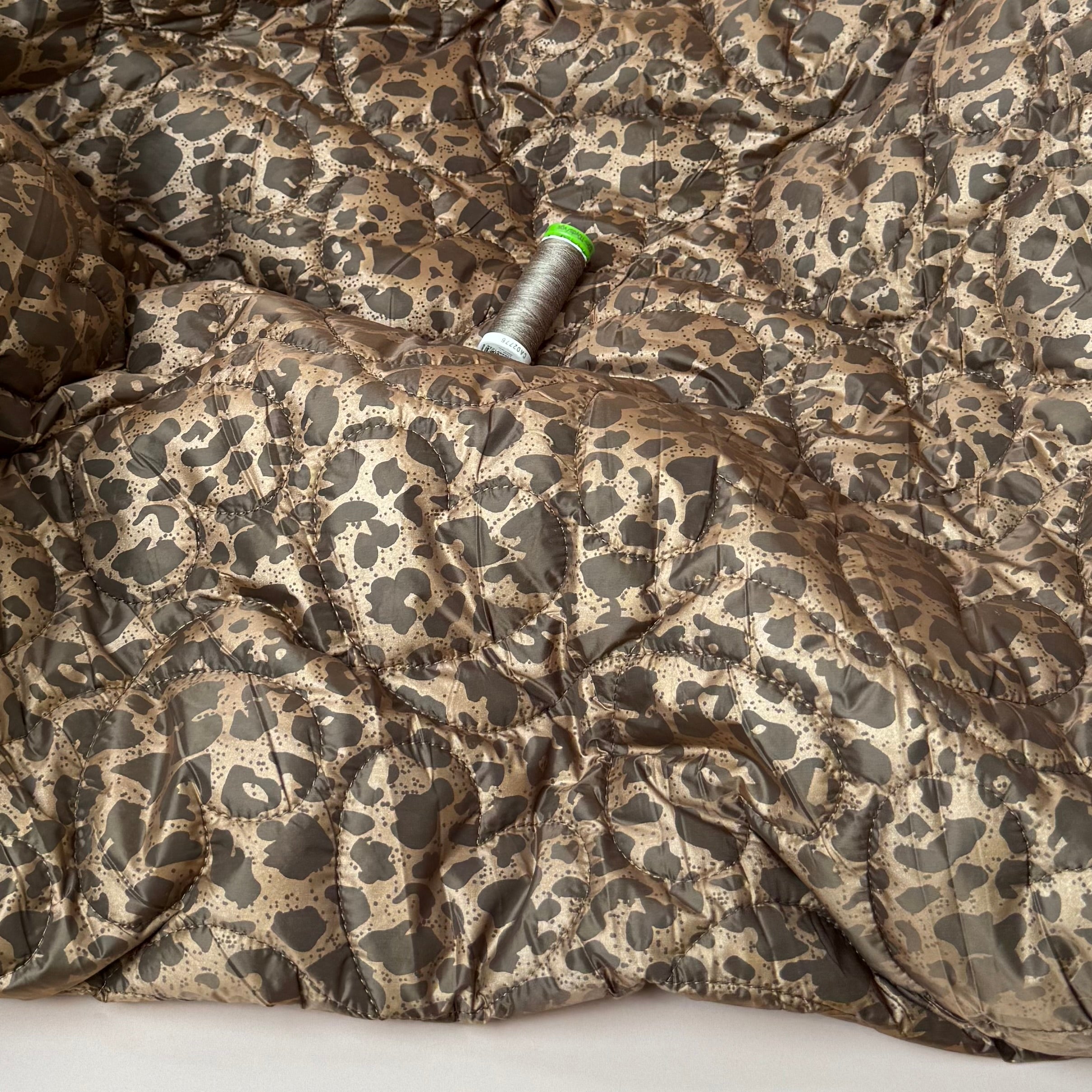 Animal print with Hearts Quilted Puffer Fabric