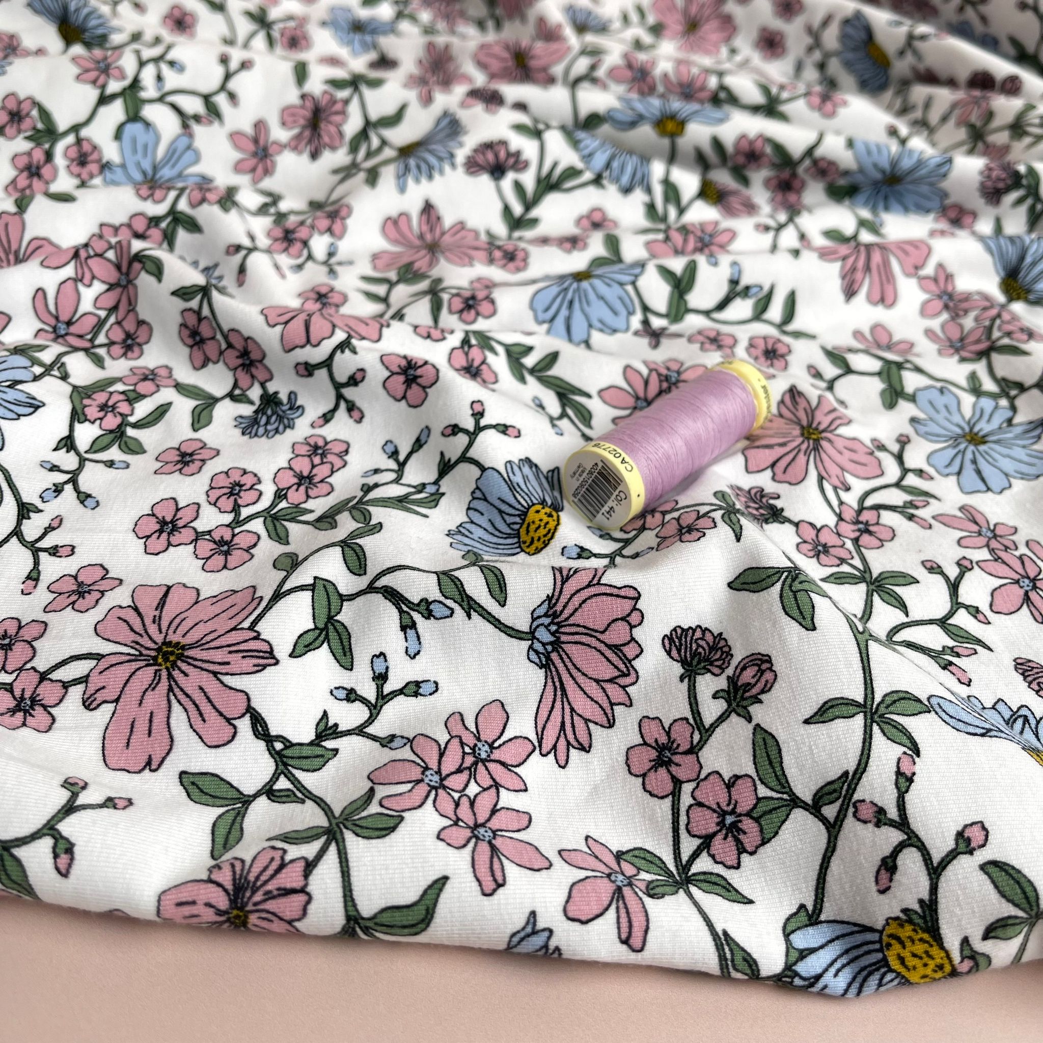 Pink Flowers on White Cotton Jersey Fabric