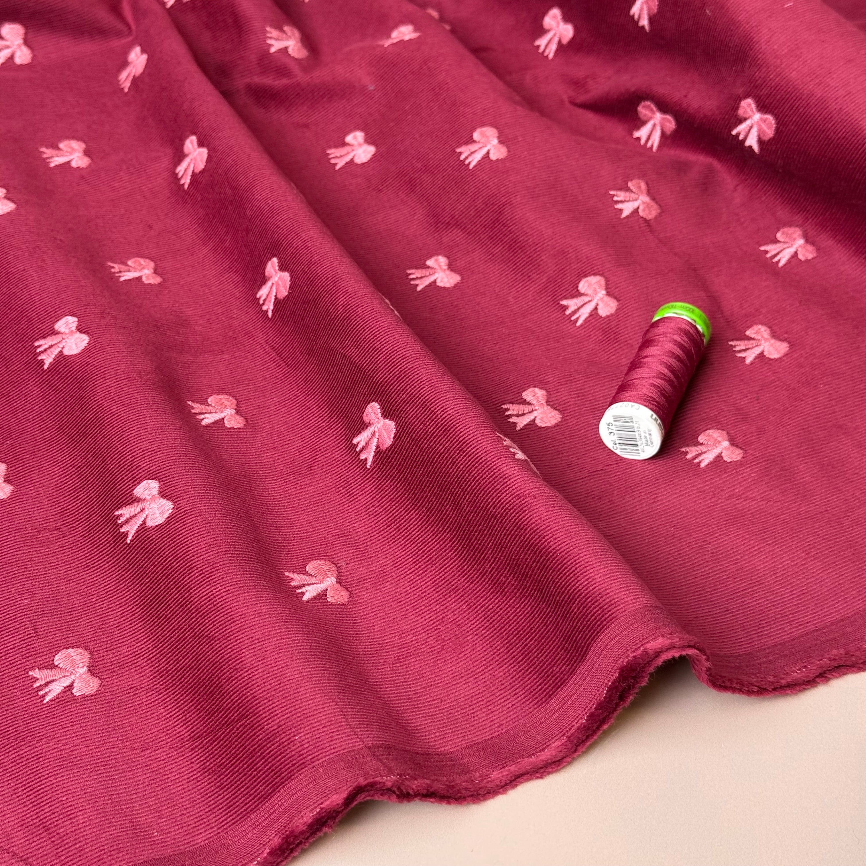 REMNANT 2.34 Metres - Embroidered Bows on Bordeaux Cotton Needlecord