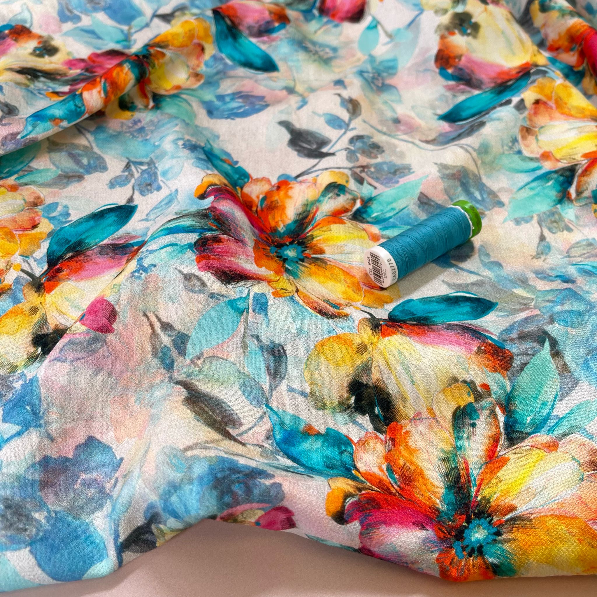 Watercolour Sunset Blooms on Turquoise Textured Viscose Fabric