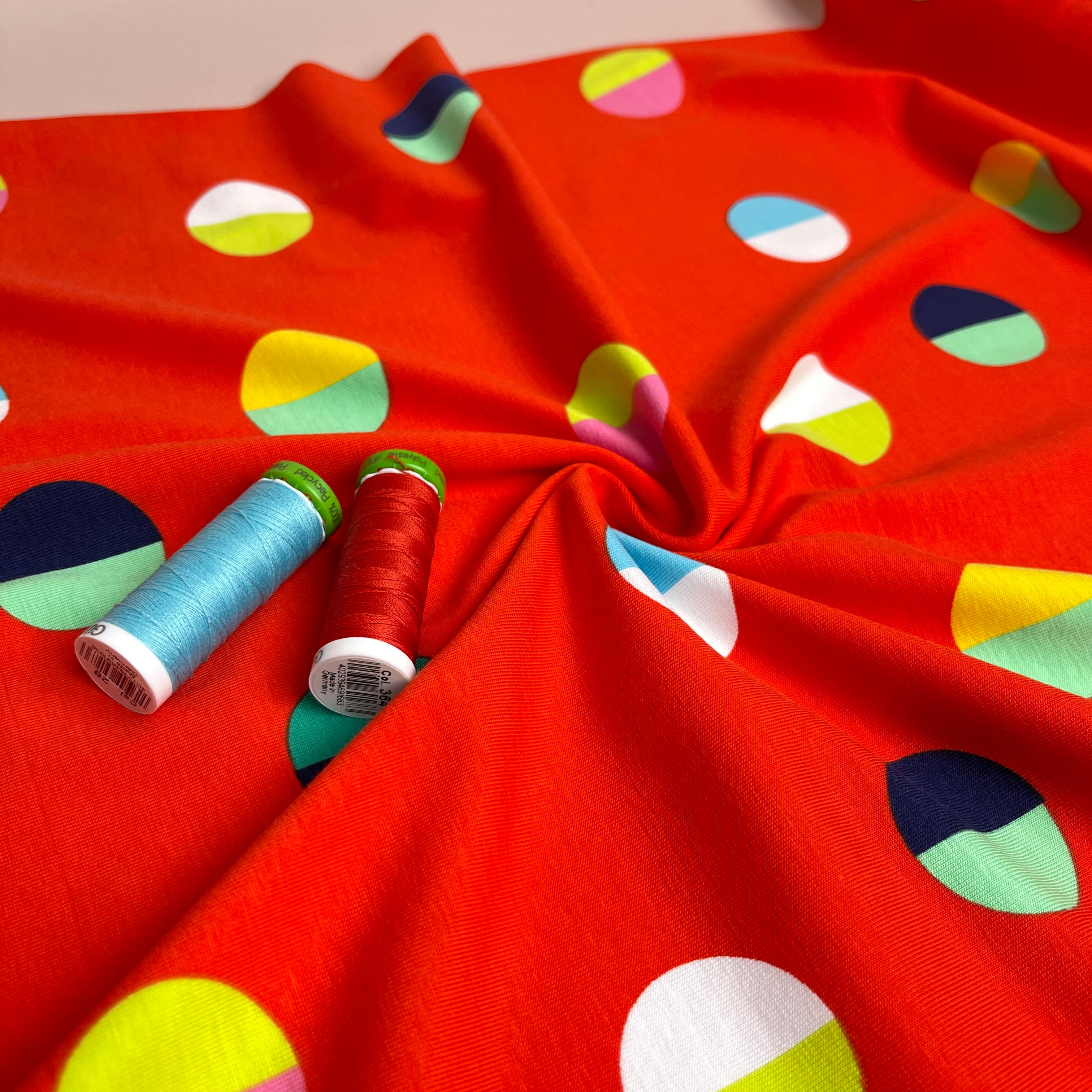 Split Circles on Red Cotton Jersey Fabric