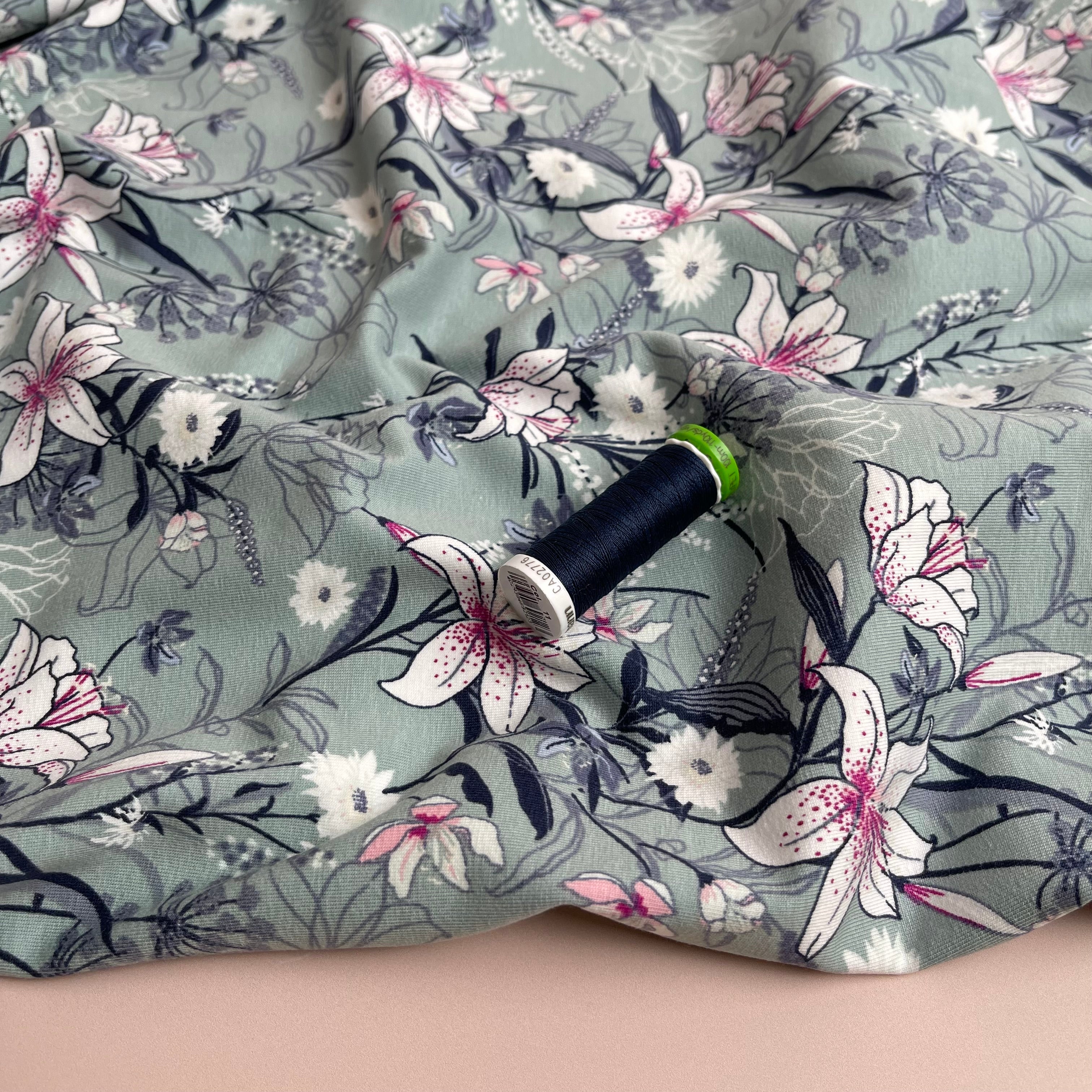 REMNANT 0.24 Metre - Lilies on Sage Green Cotton Jersey Fabric