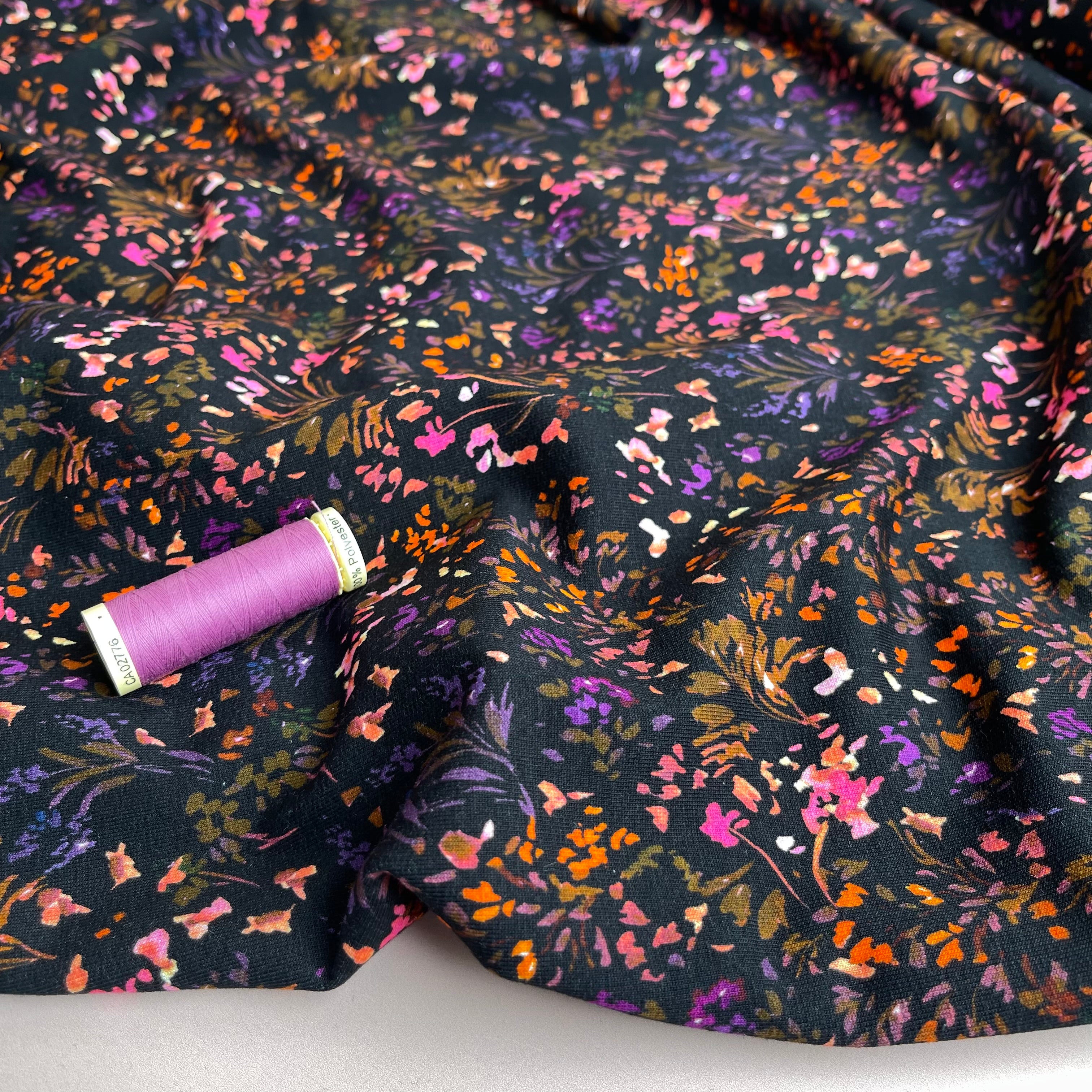 REMNANT 0.5 Metre - Small Flowers on Black Cotton French Terry