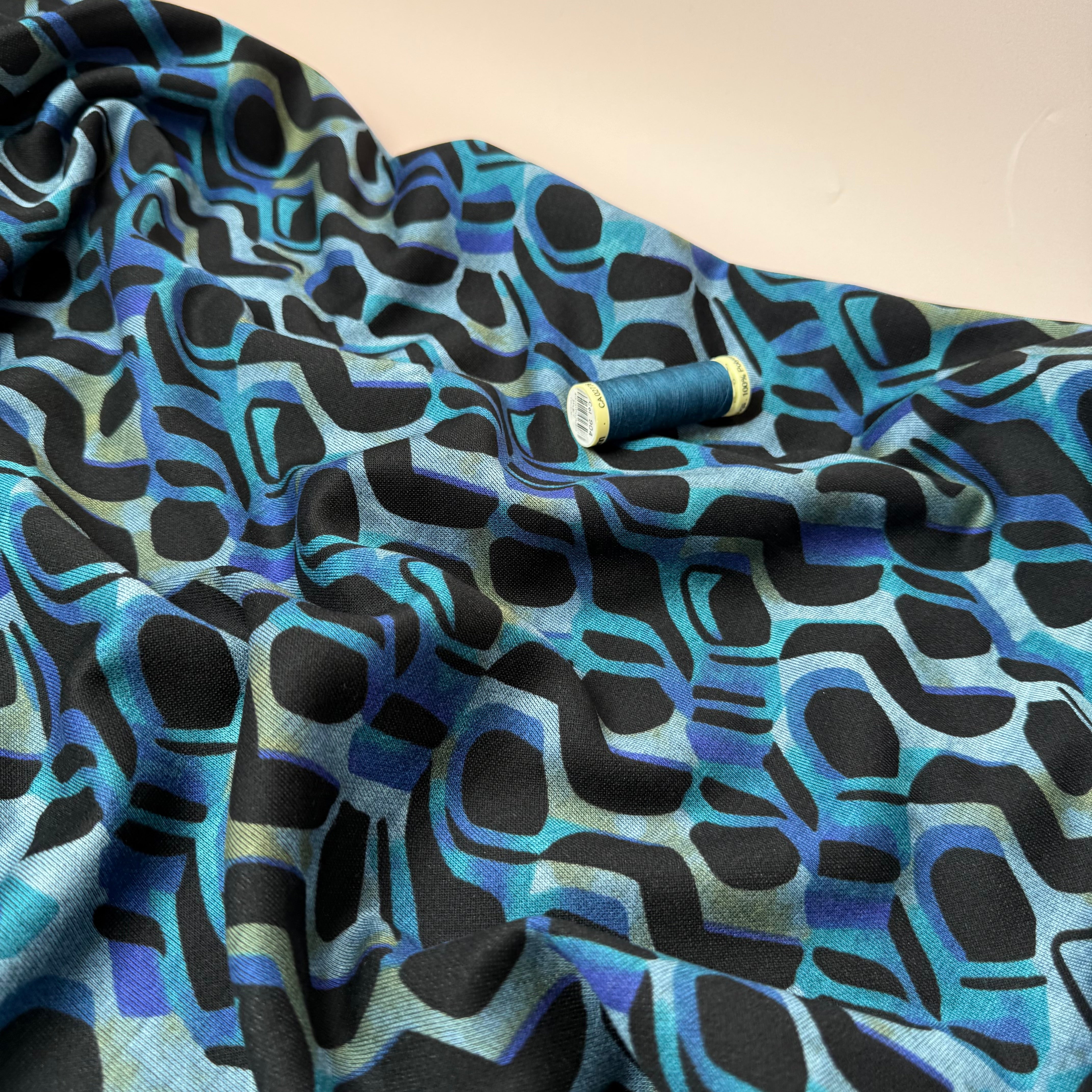 Graphic Swirls in Petrol Soft Ponte Interlock Jersey Fabric