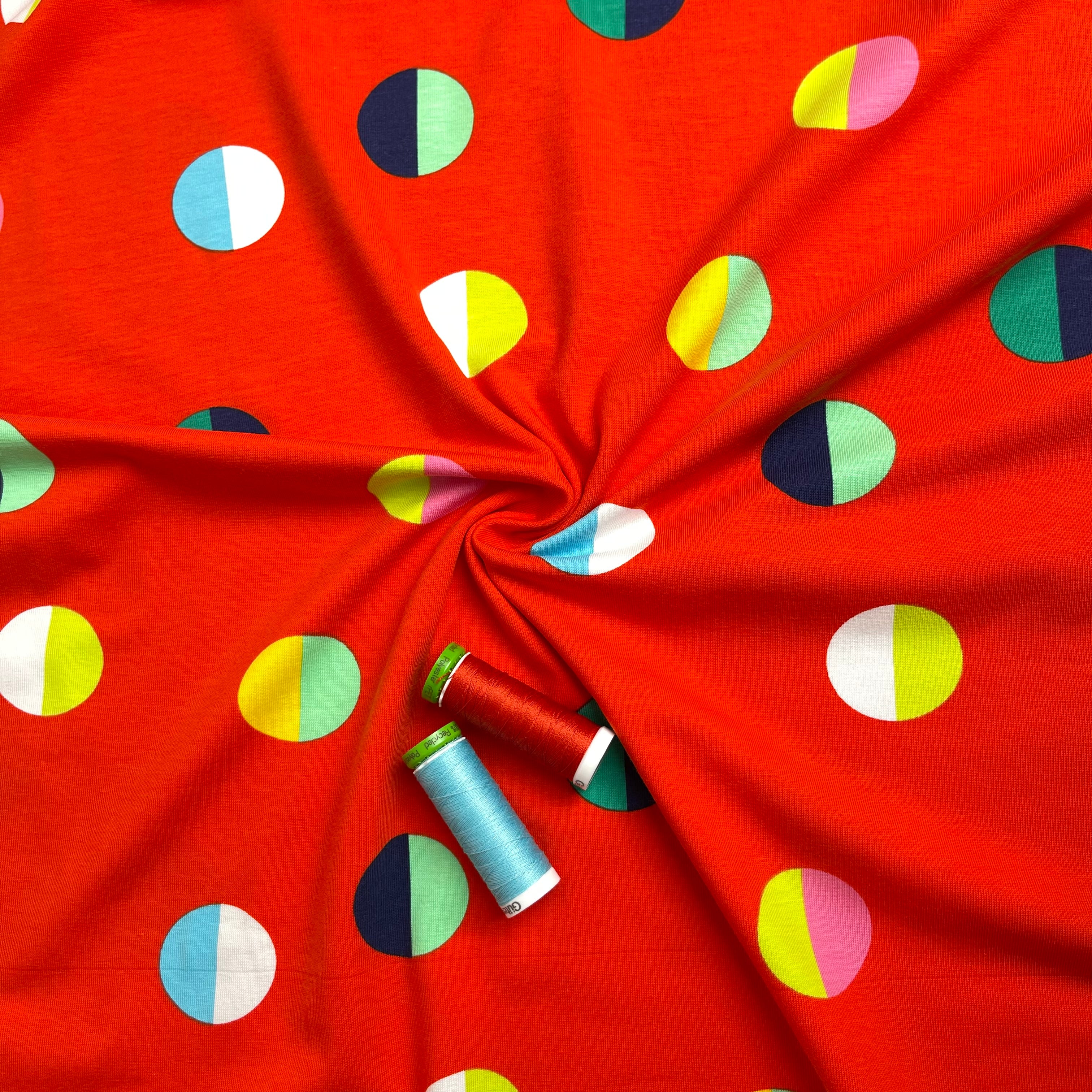 Split Circles on Red Cotton Jersey Fabric