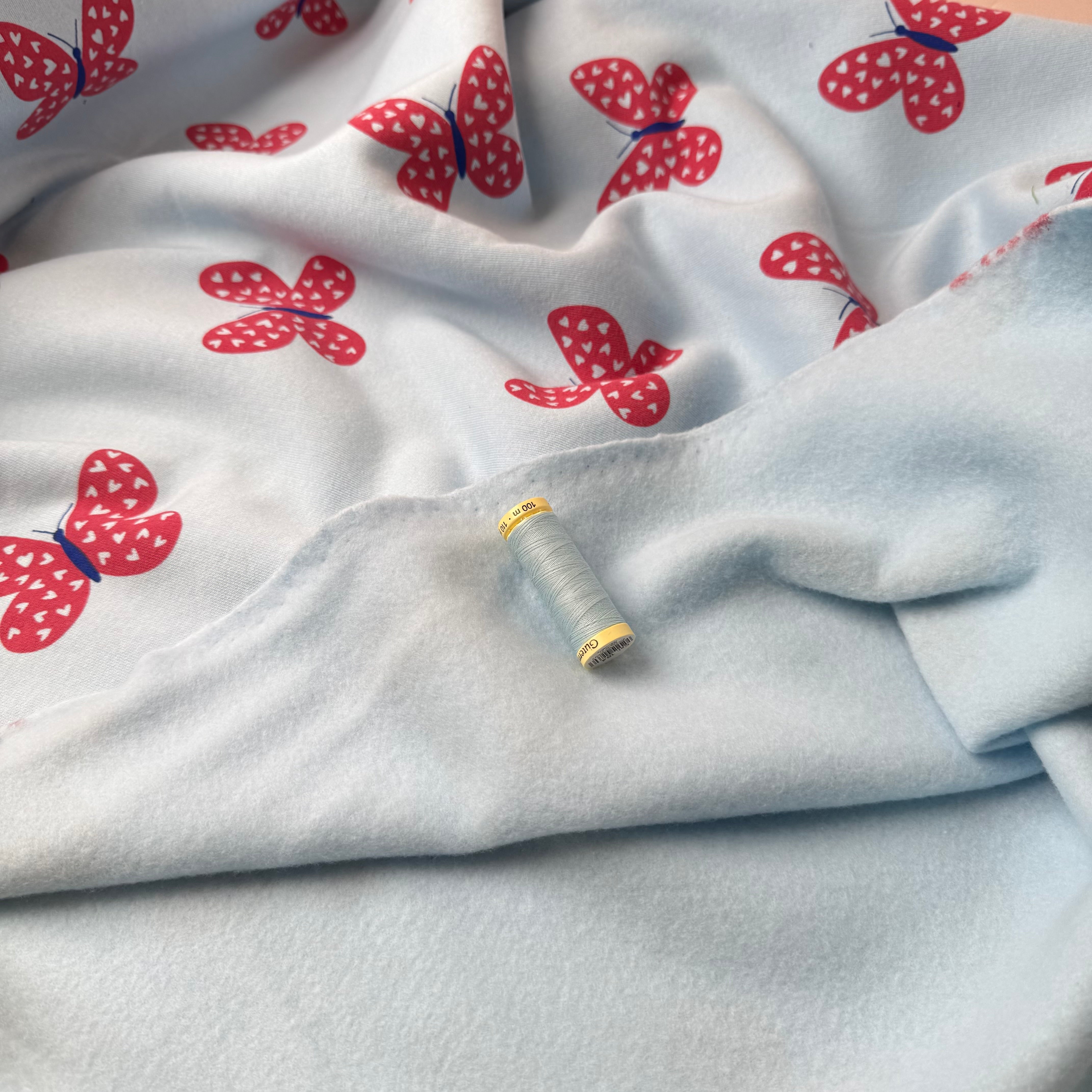 Butterflies on Icy Blue Soft Cotton Sweat-shirting Fabric