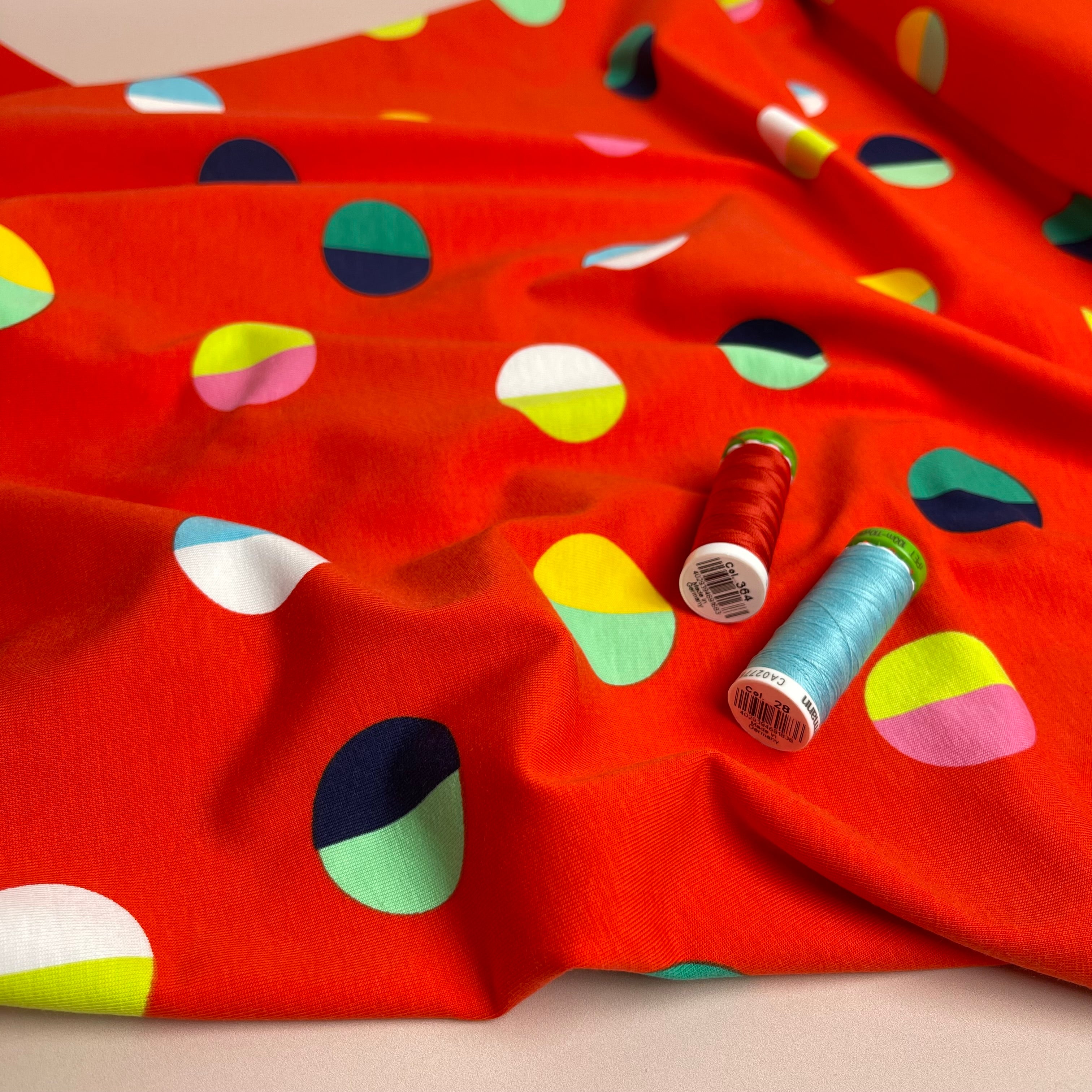 Split Circles on Red Cotton Jersey Fabric